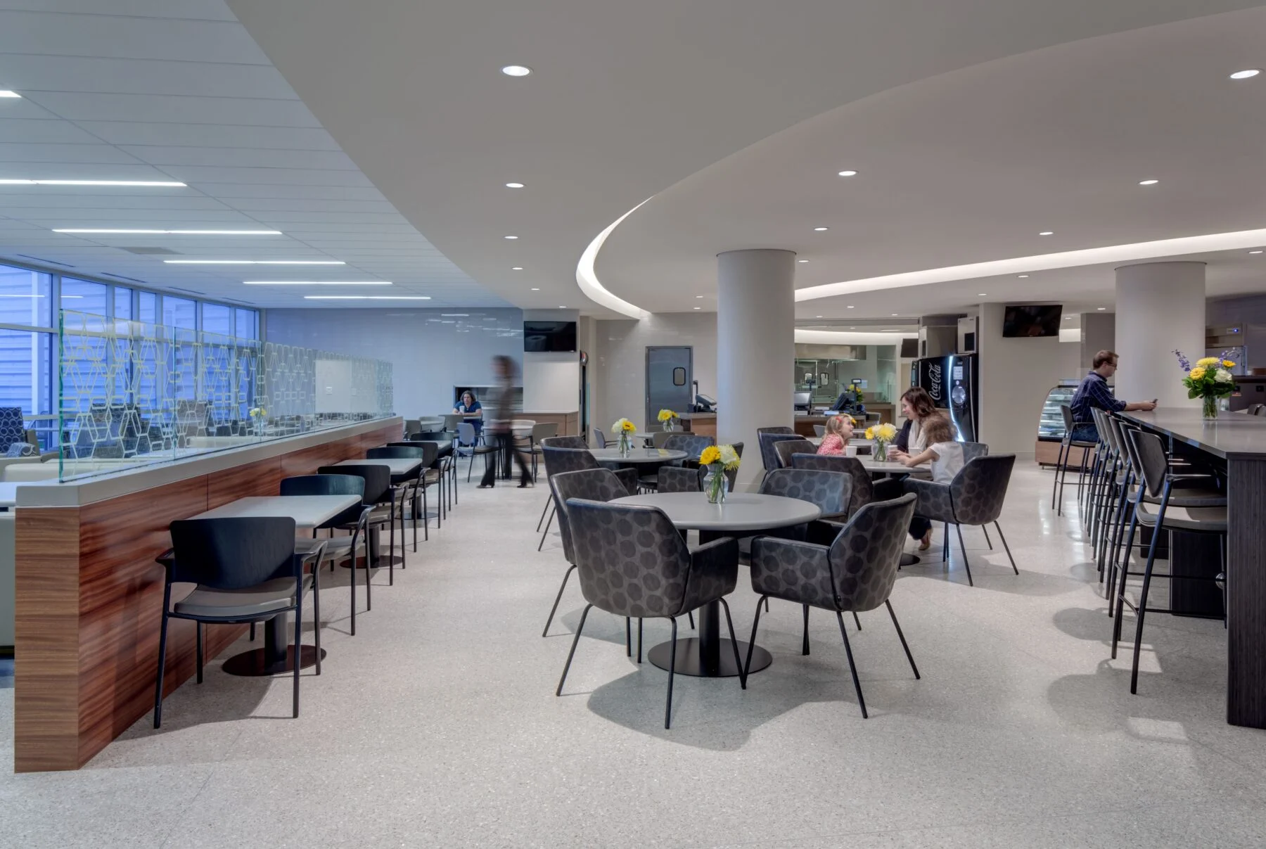 lobby and cafeteria space with exposed columns