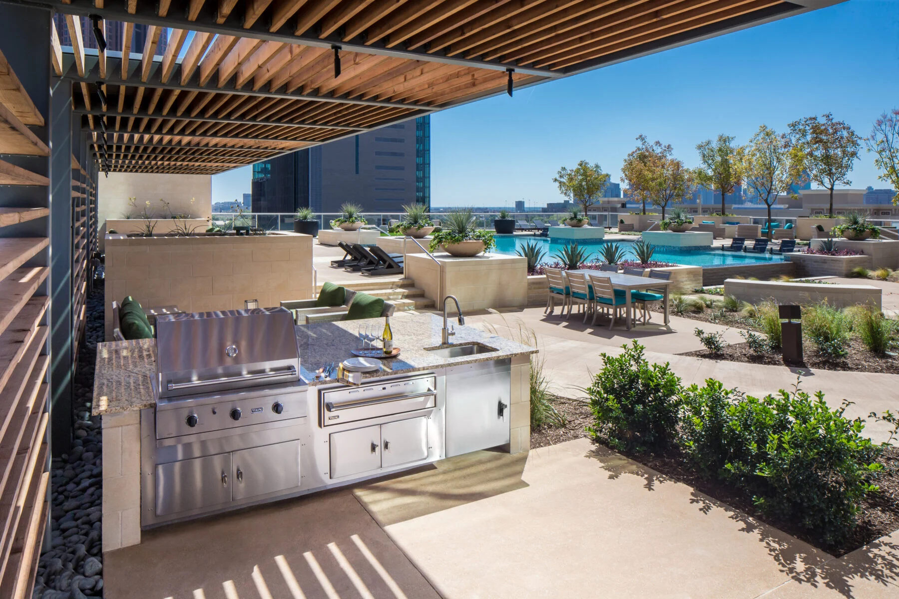 outdoor pool with covered grilling