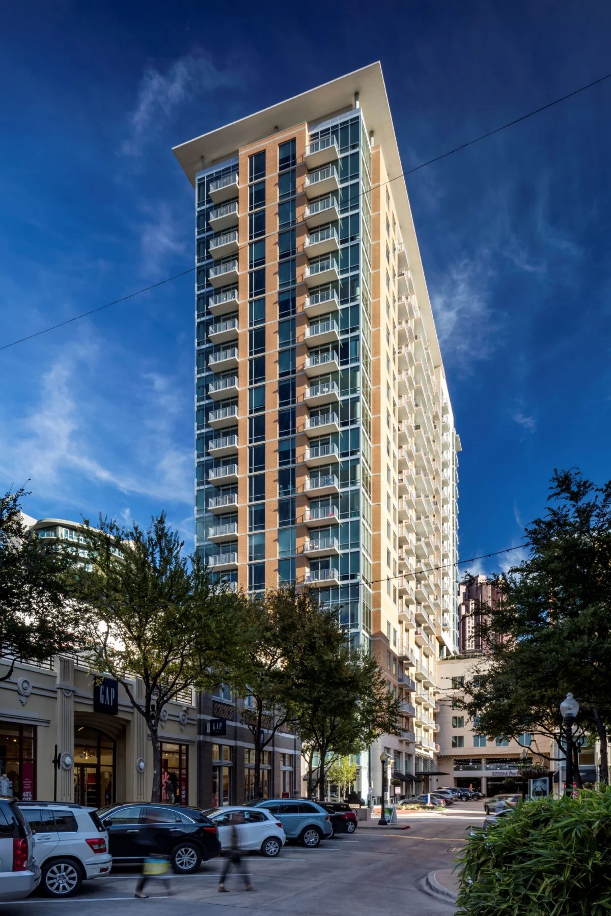 three buildings in mixed use space including 21 story residential tower
