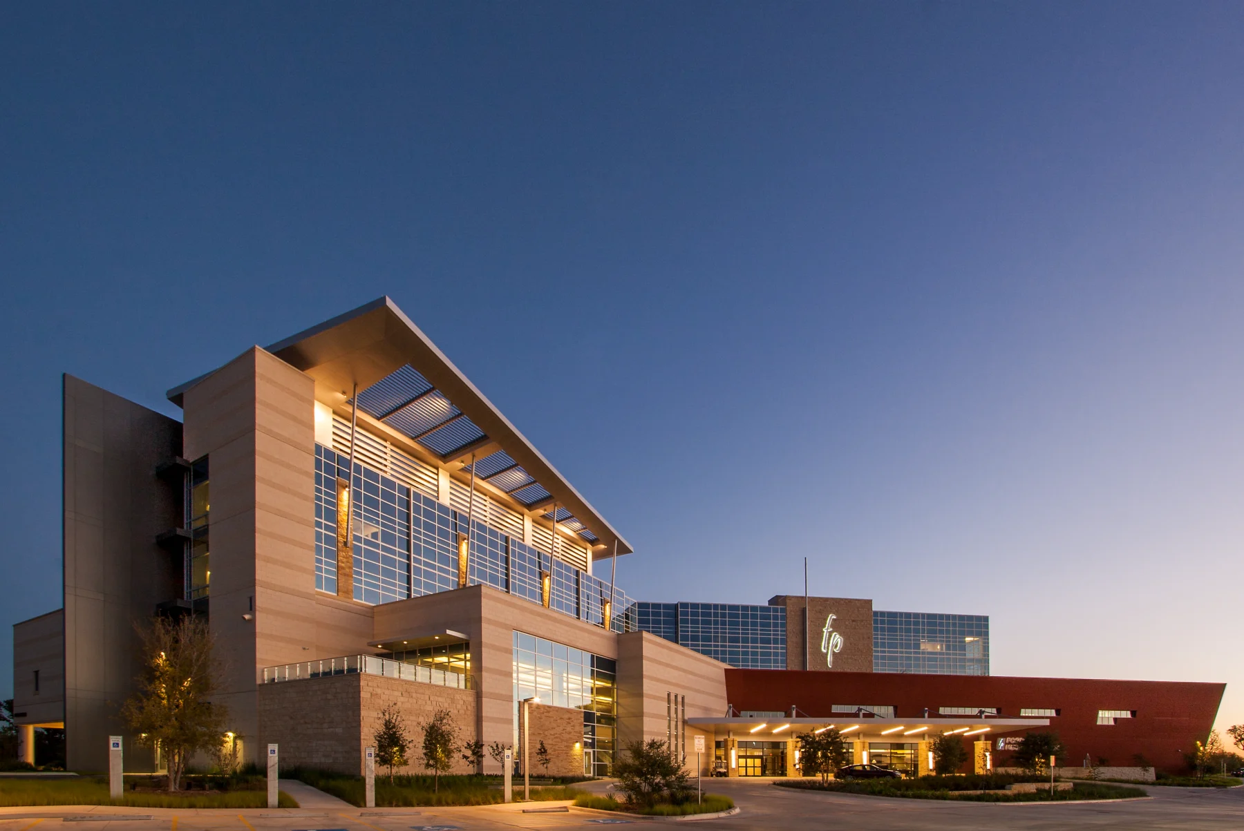 medical facility with adjacent surgery suite with stone and canopy