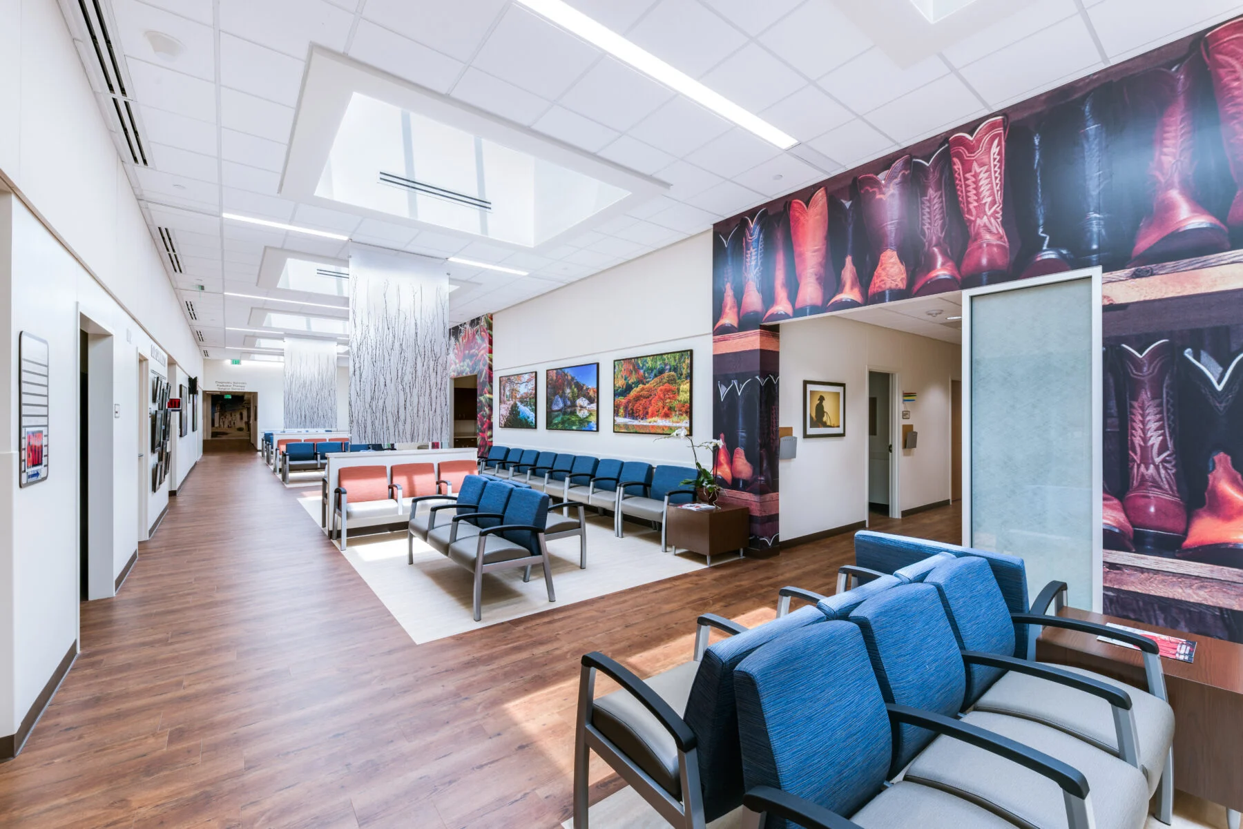 waiting room with floral art on wall