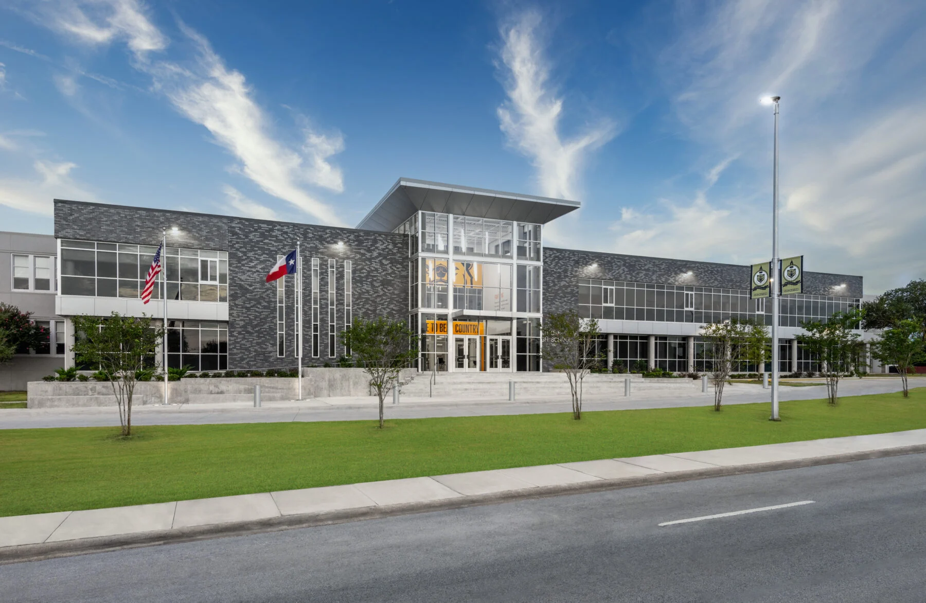 exterior of high school with blue sky
