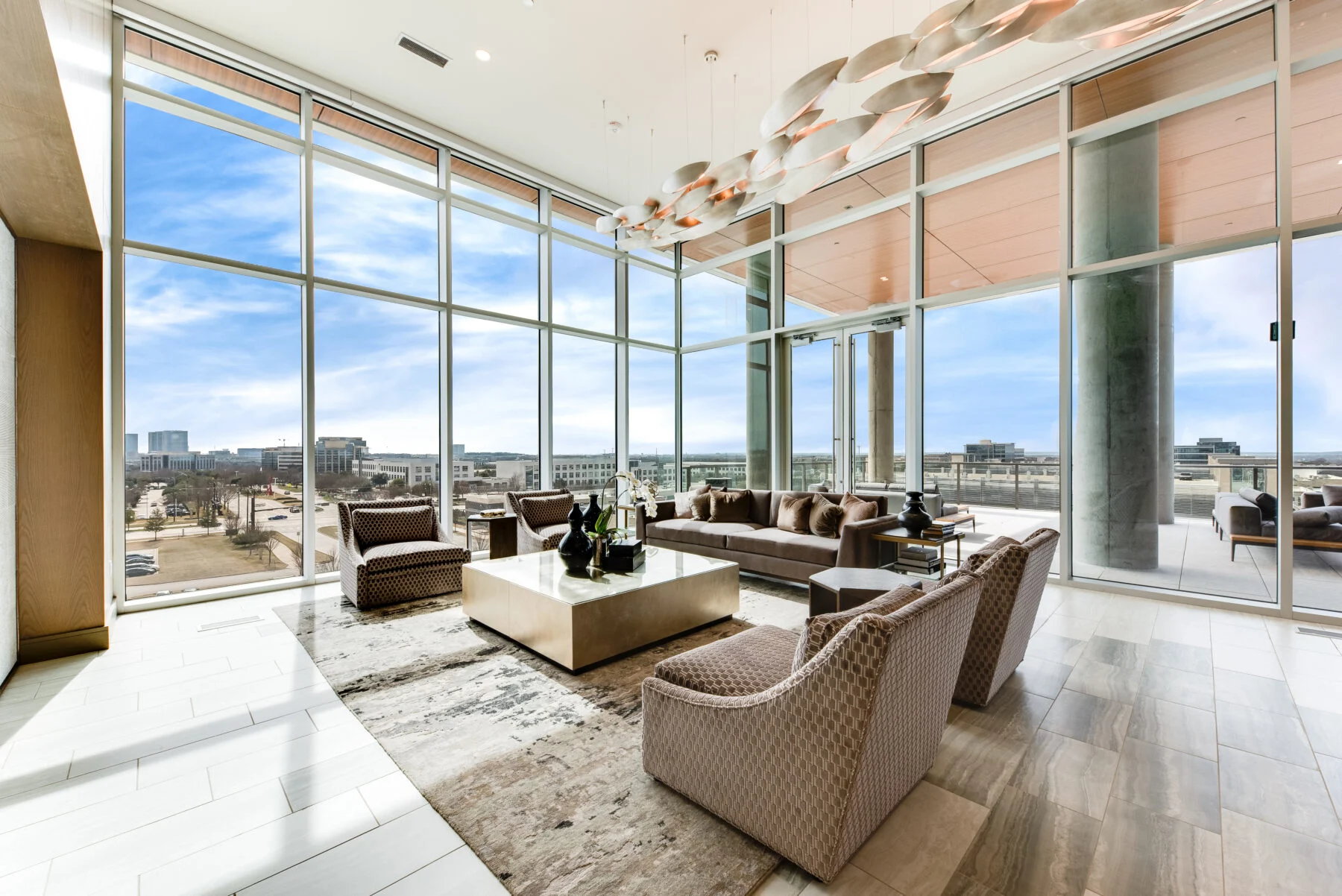 community gathering space with floor to ceiling windows