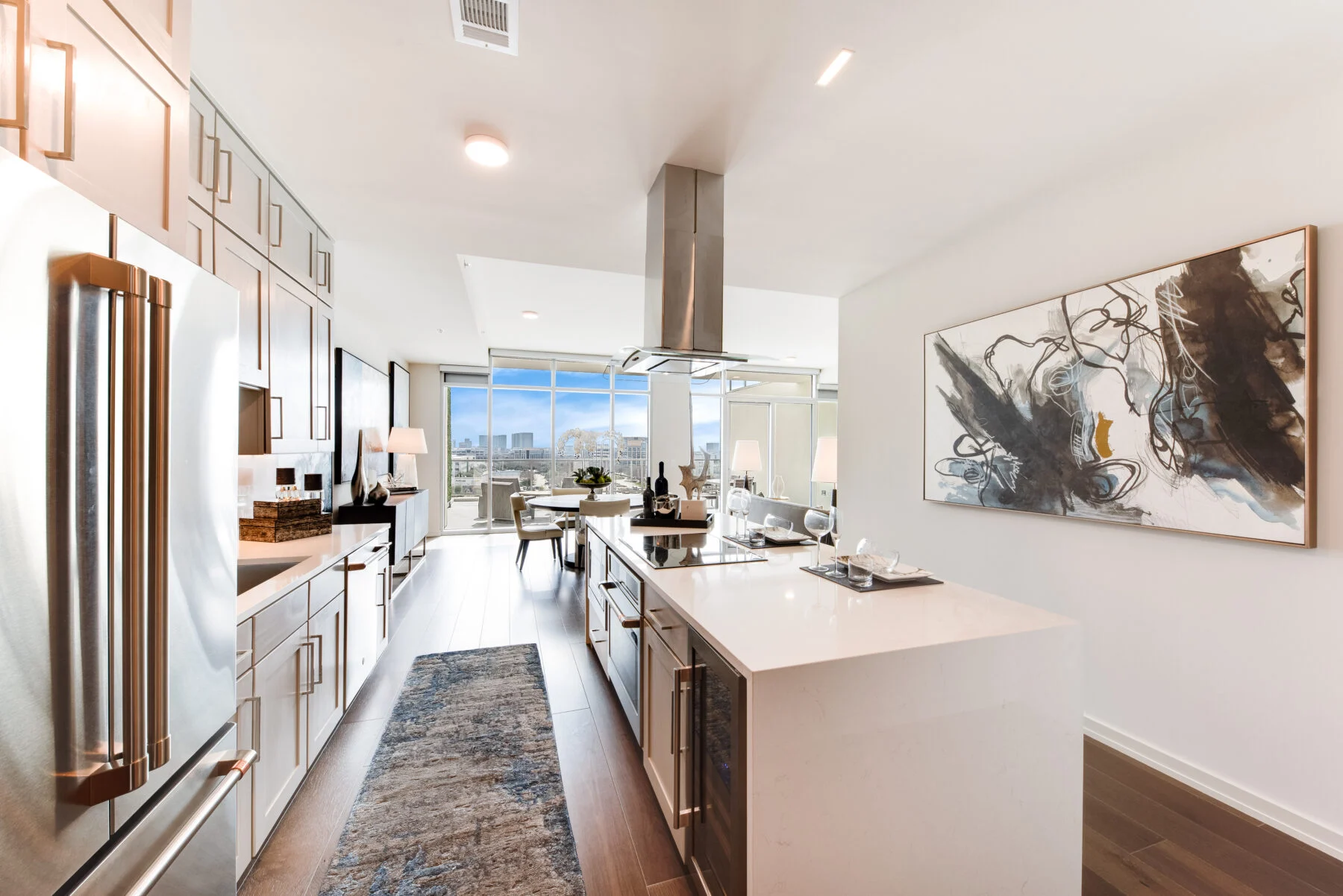 apartment kitchen with island and venthood
