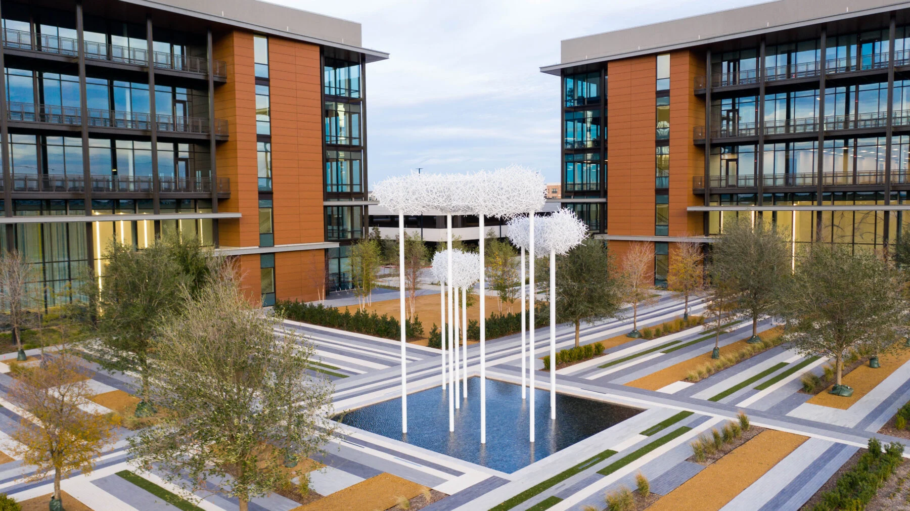 fountain with two five storybuildings