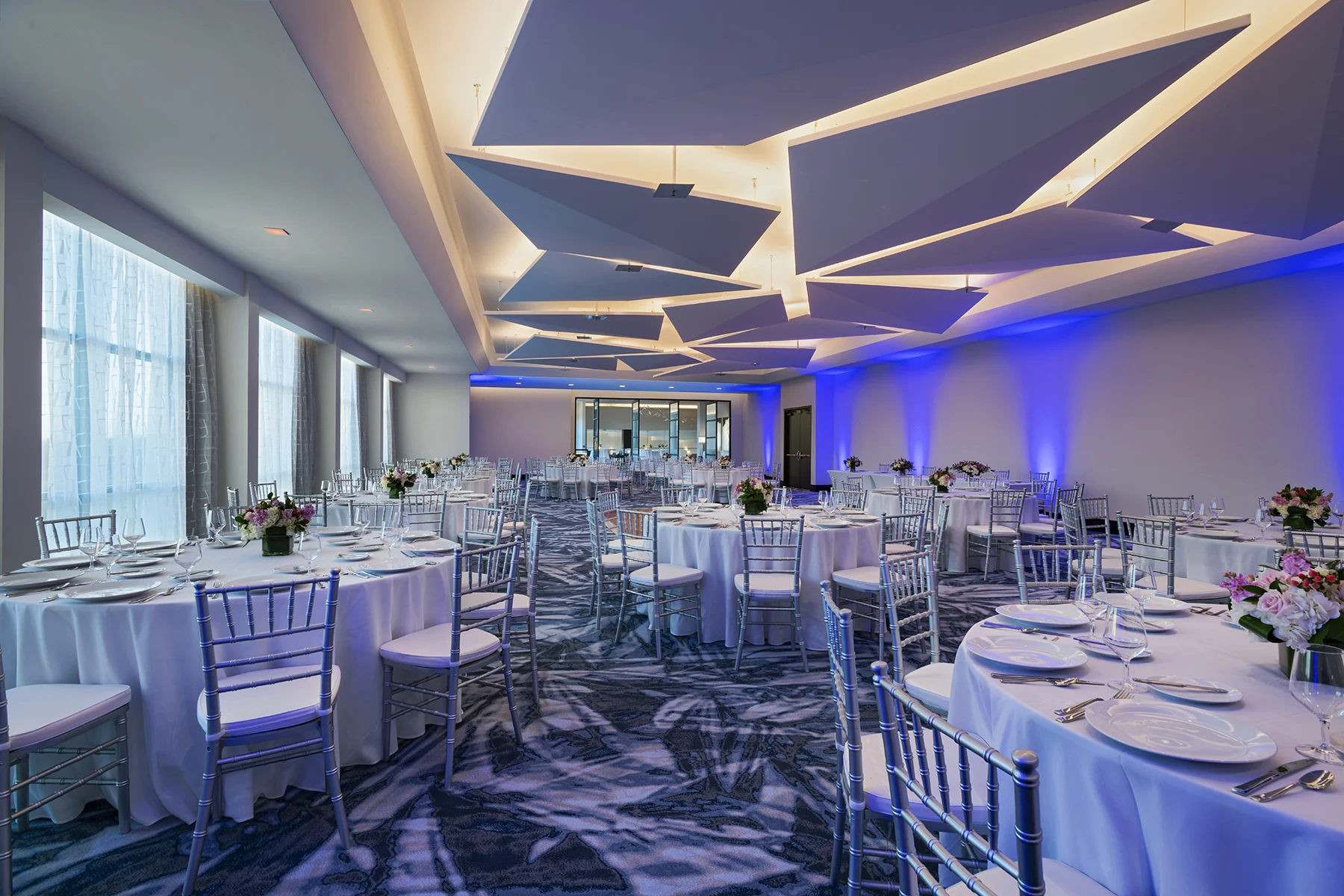 Conference room dining hall with impressive ceiling artwork and lighting