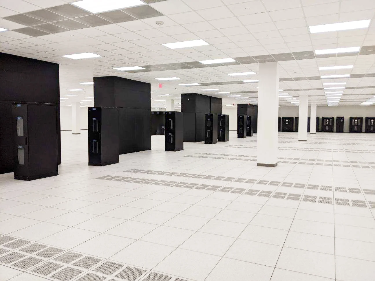 data hall with white floors columns and ceilings