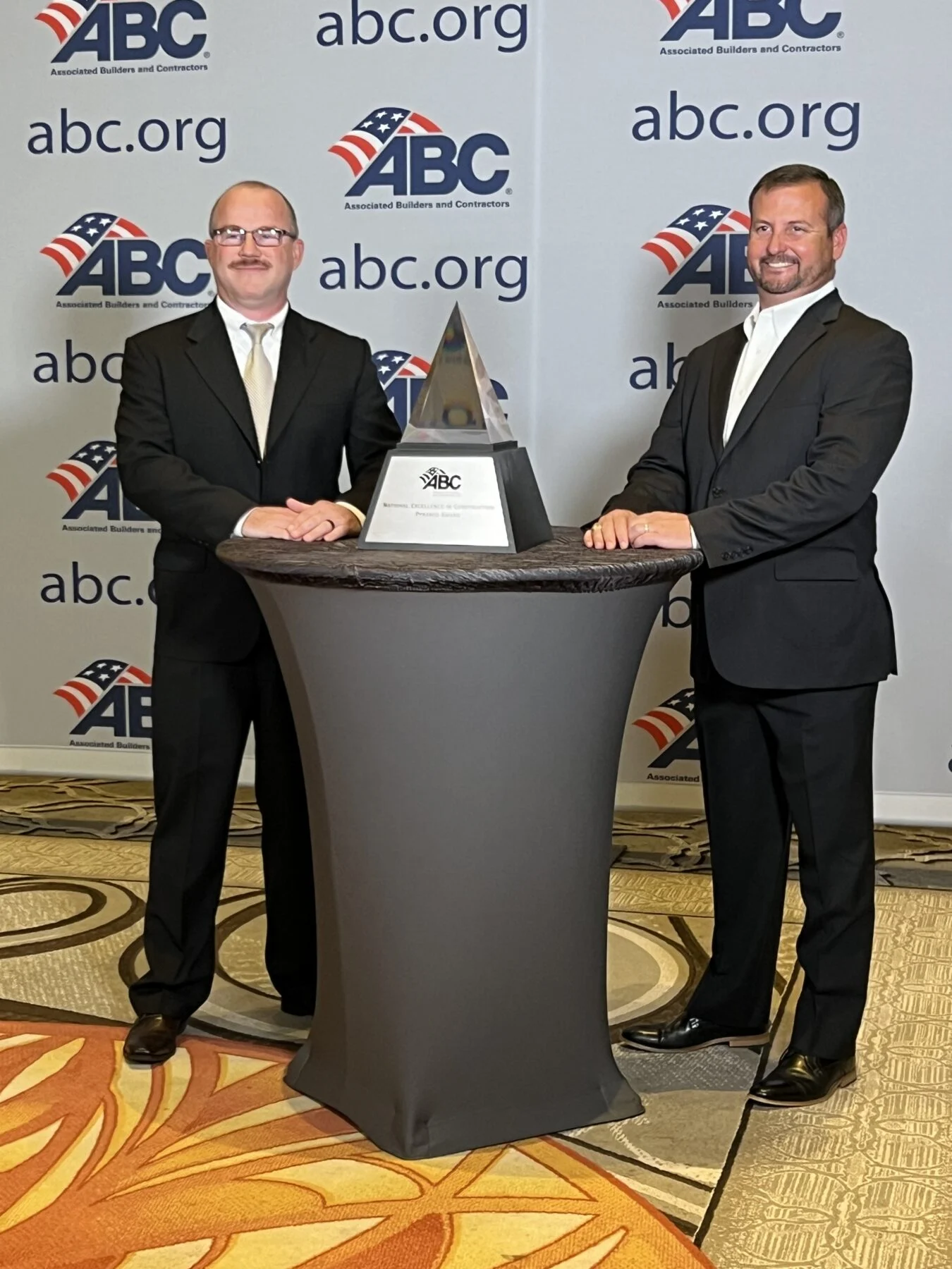 project team accepts ABC pyramid award