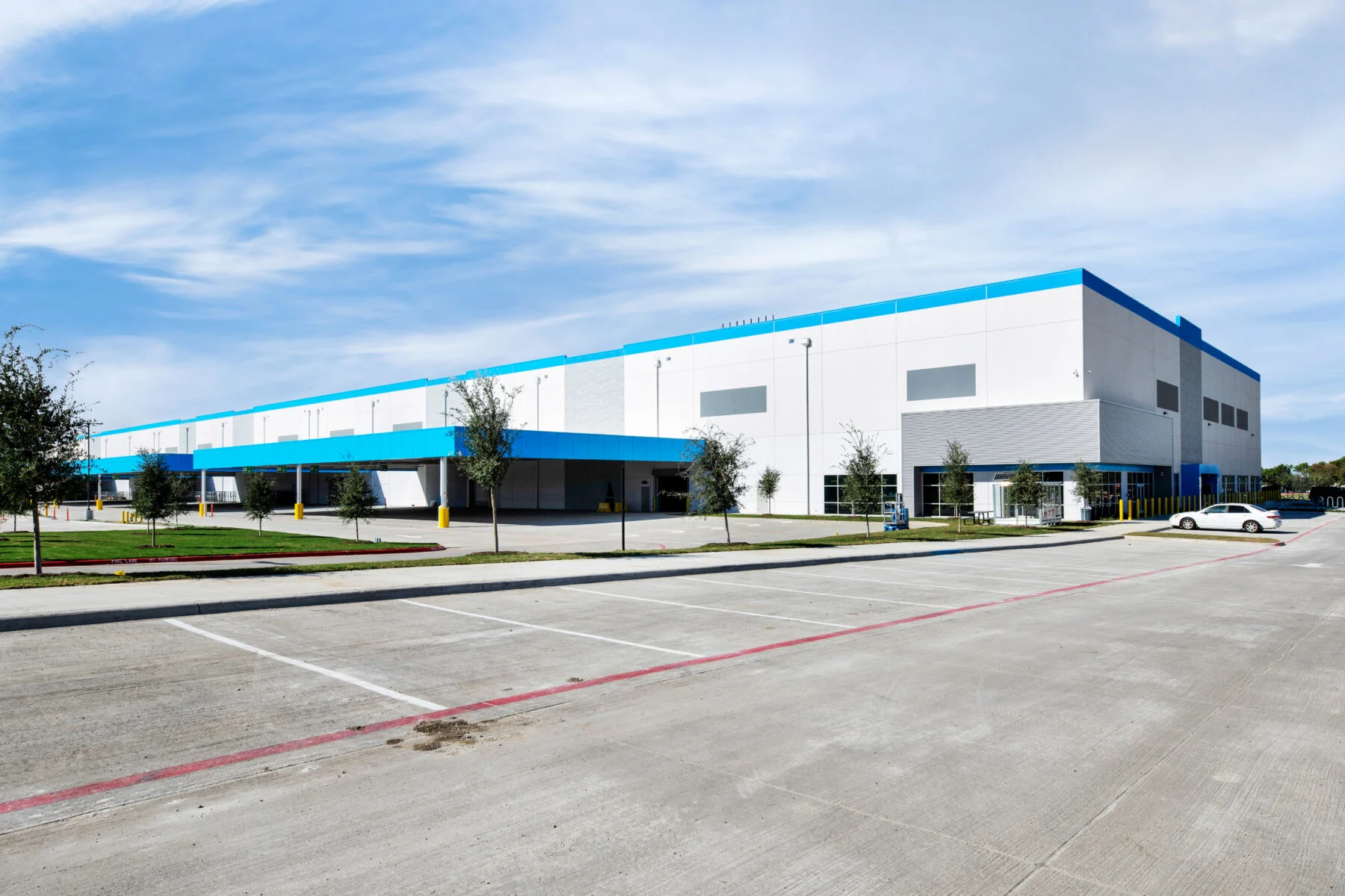 exterior of distribution facility in white and blue
