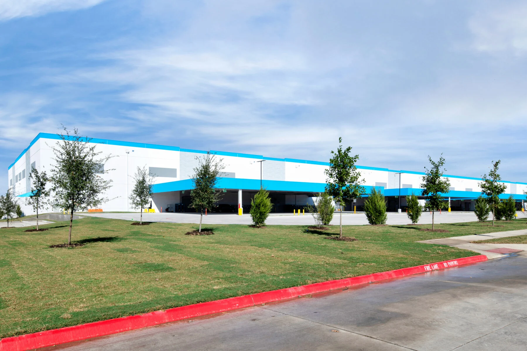 exterior of distribution facility in white and blue