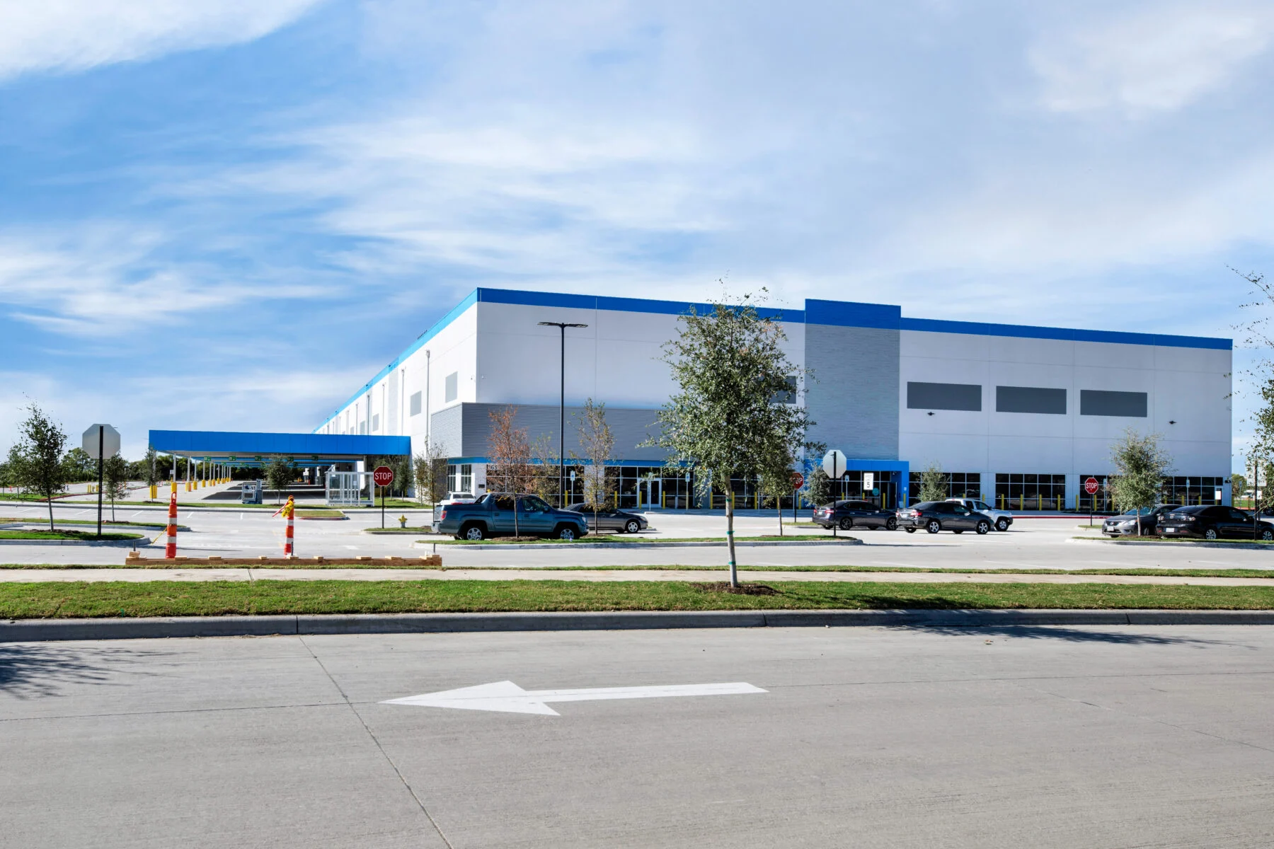 exterior of distribution facility in white and blue