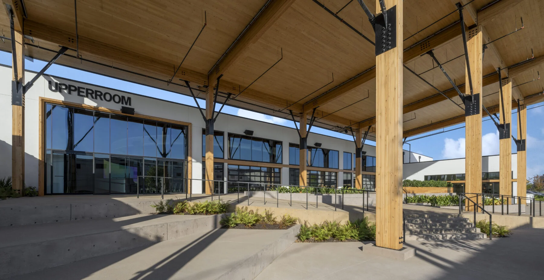 custom wood awning over church entrance with large windows