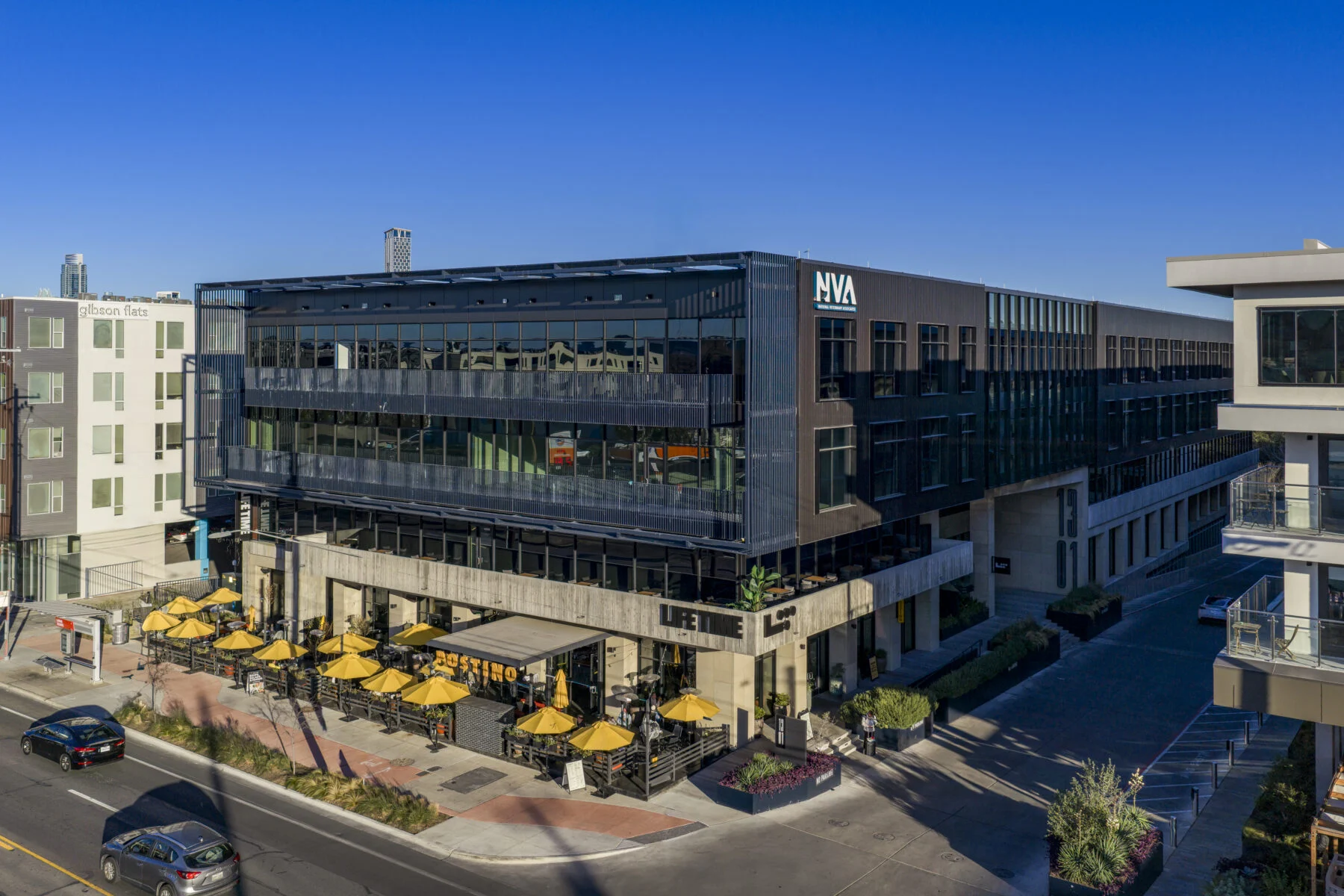 four story building with retail ground and office story above