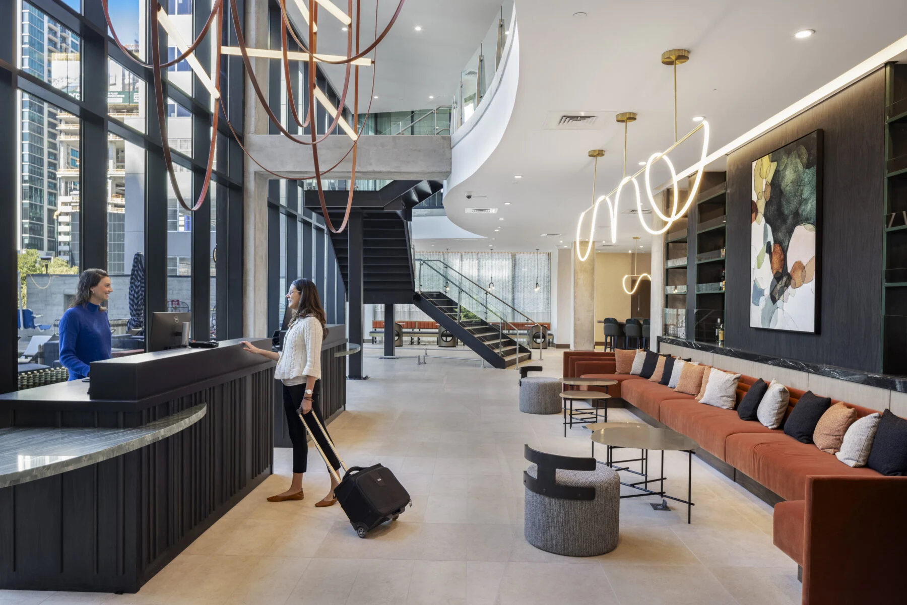 Check in desk with custom lighting and modern accents
