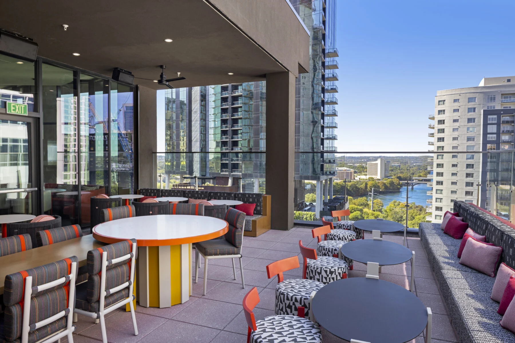 Rooftop bar overlooking downtown Austin with custom furniture.