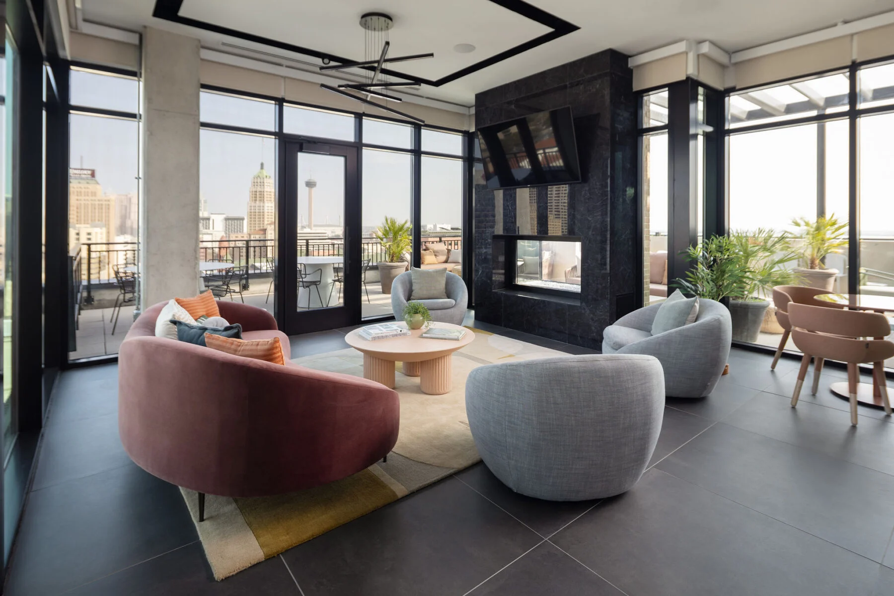 community lounge space with floor to ceiling windows
