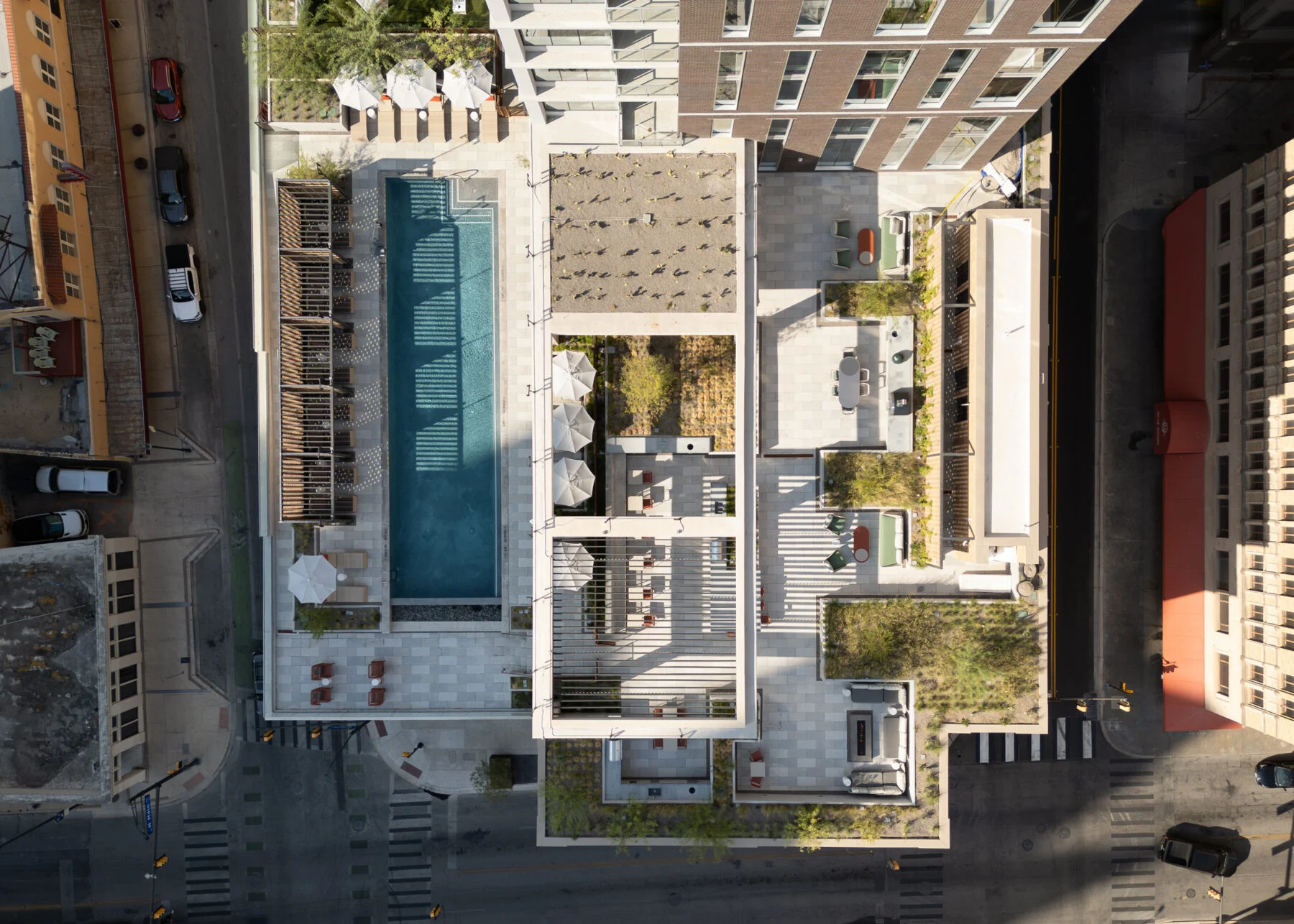 birds eye view of roof top pool and patio