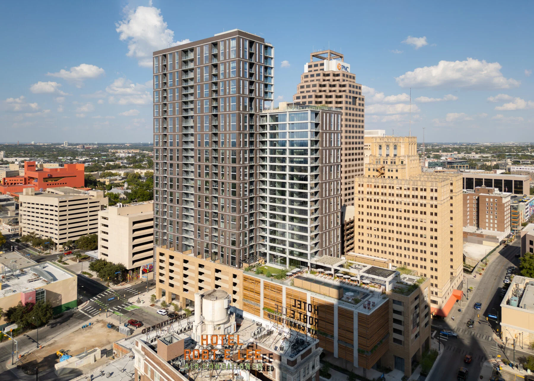 32 story high rise with parking garage