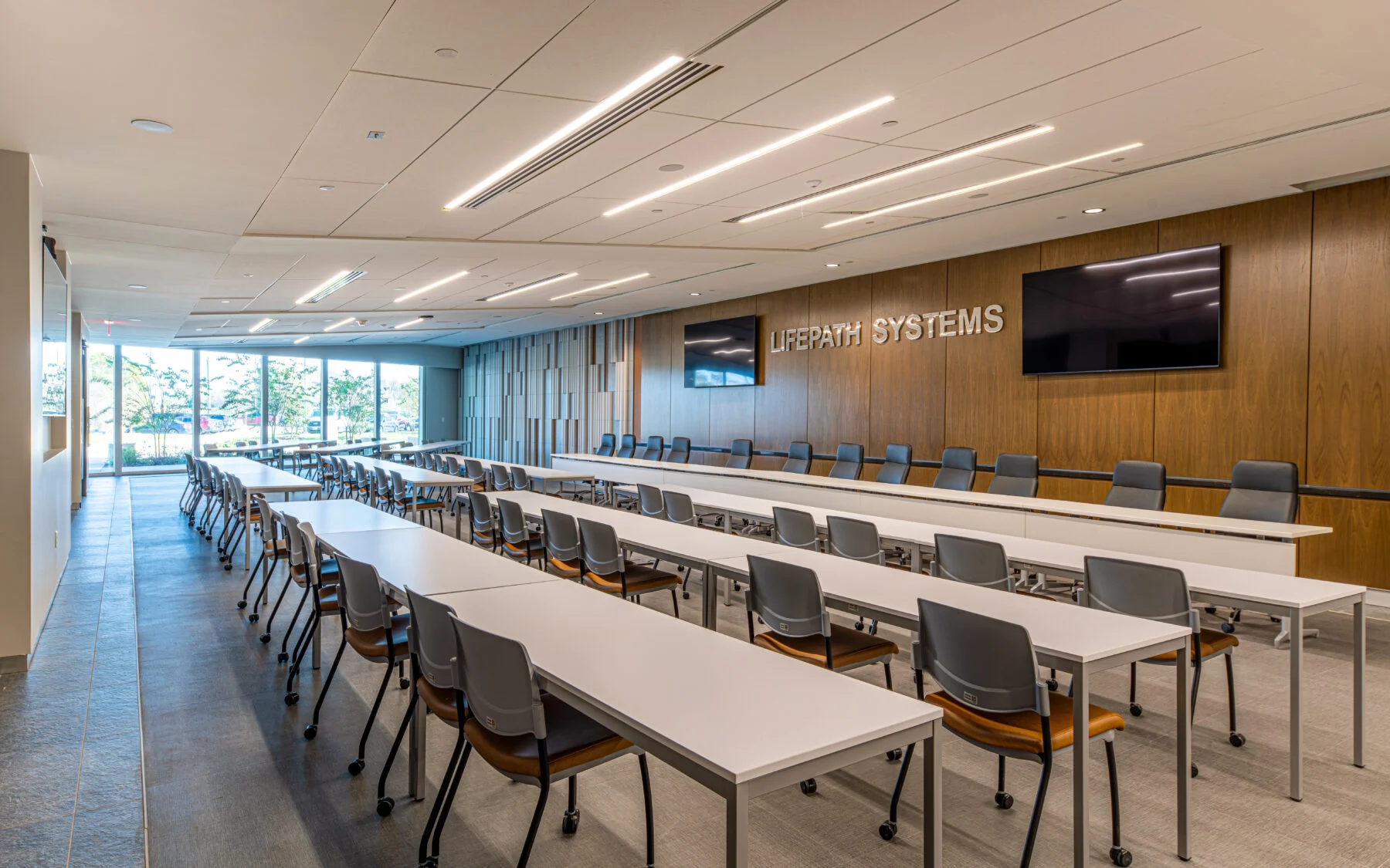 education and conference room with wood walls