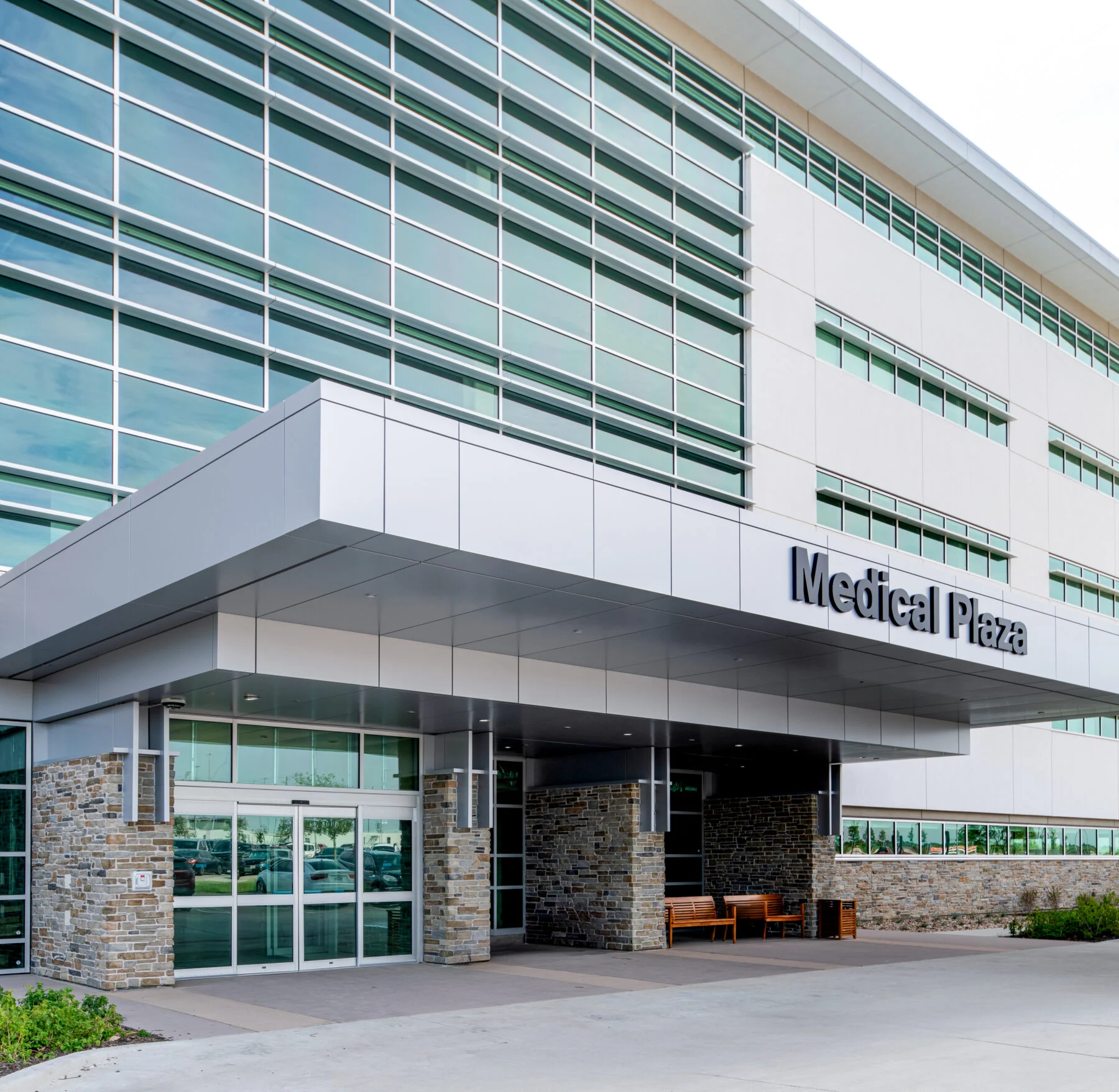 covered entrance to exterior four story medical office building