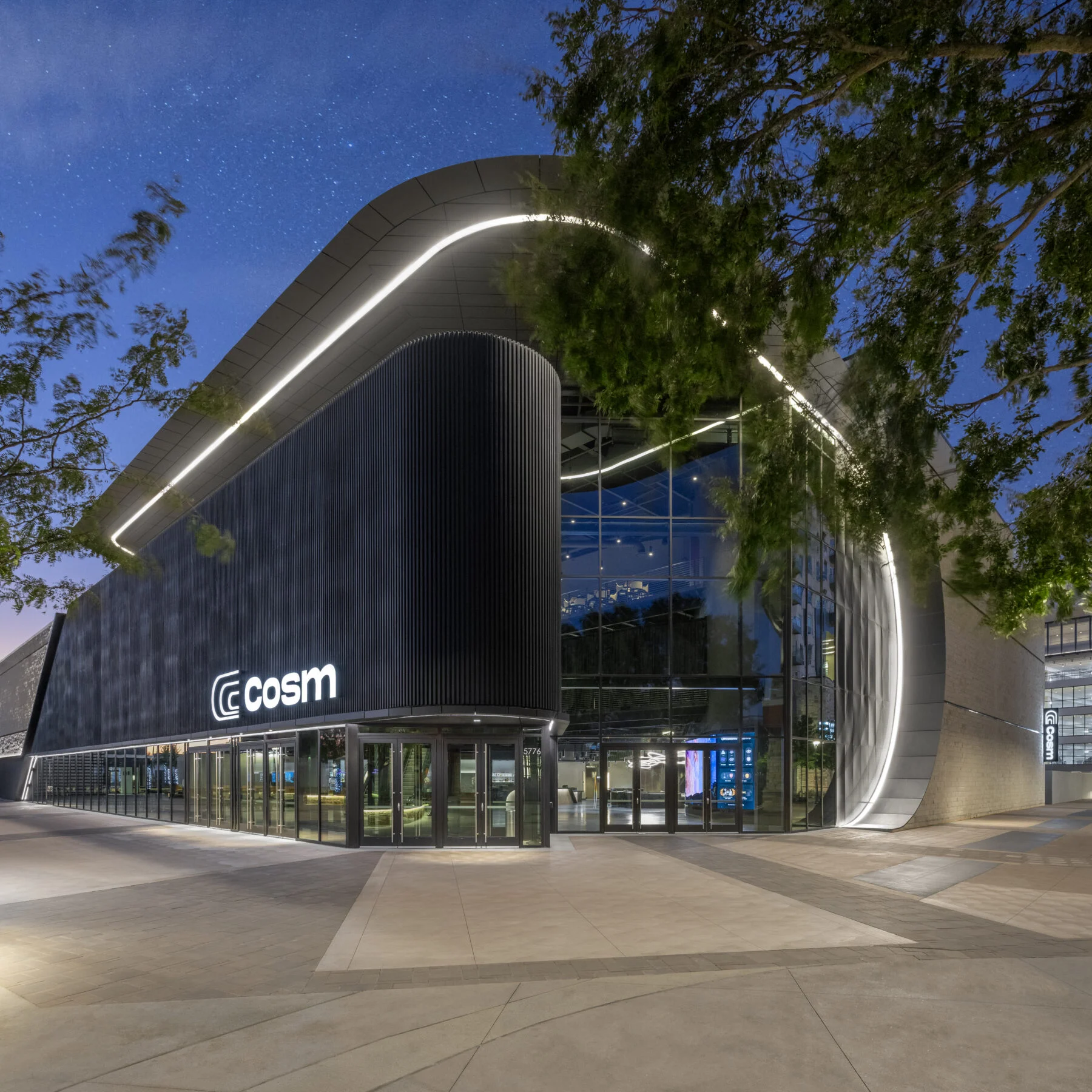 Exterior of COSM entertainment venue at the Grandscape in The Colony.