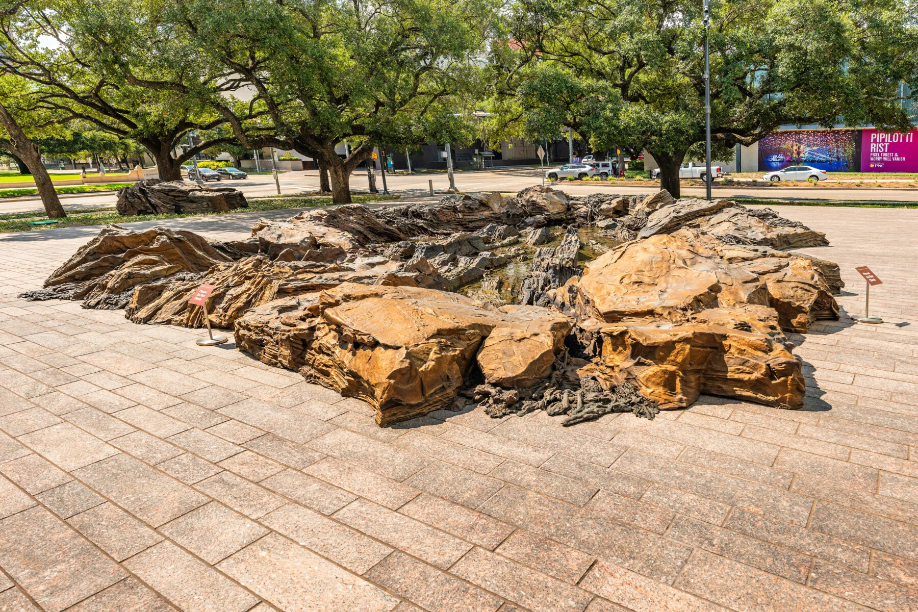 bronze fountain set in ground
