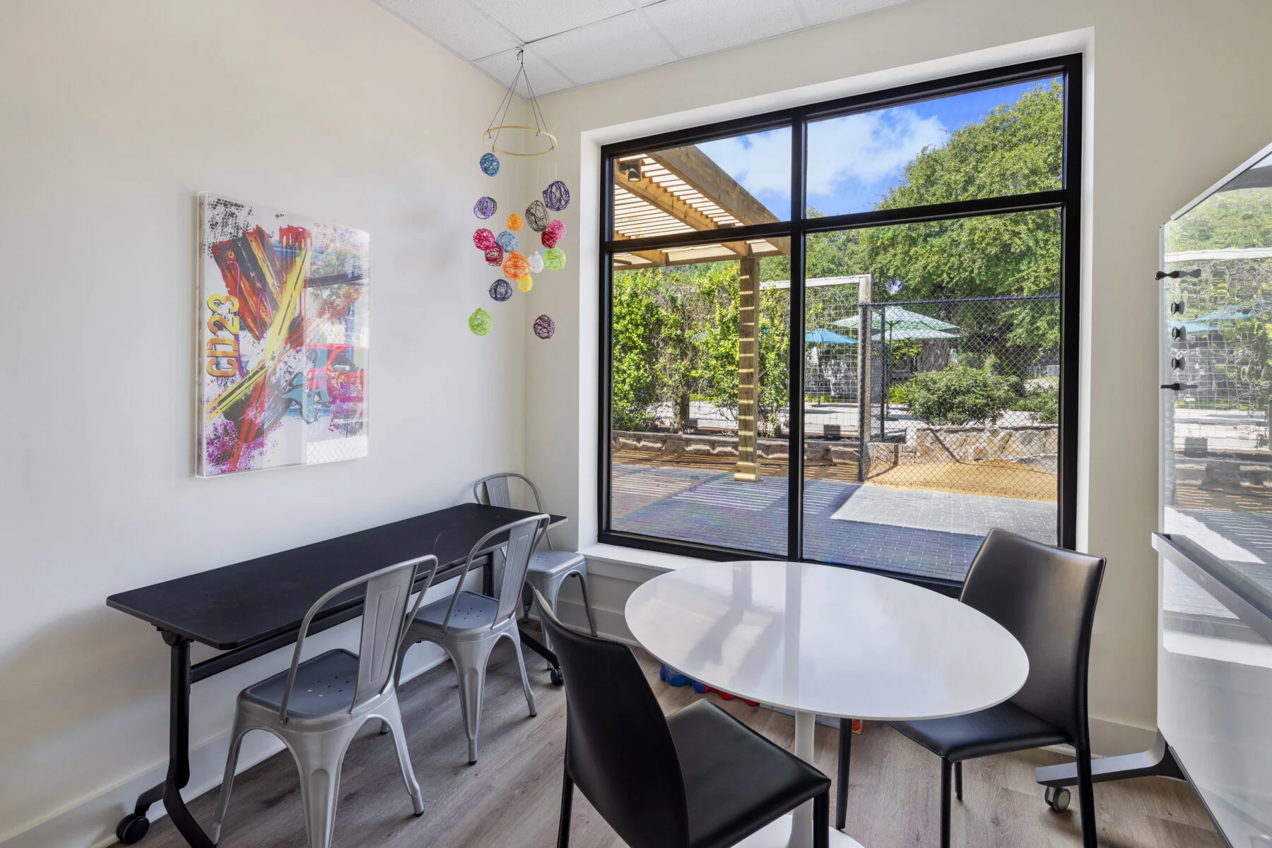 children's play room overlooking backyard space