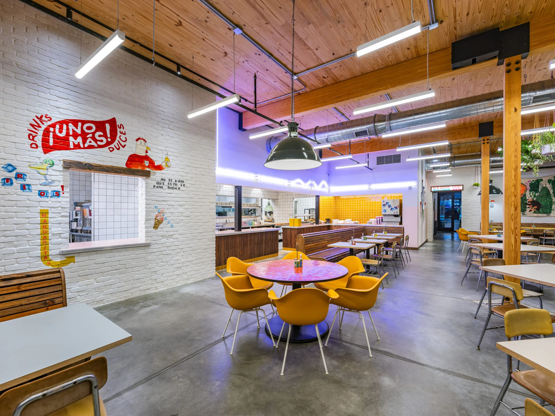 interior dining with white tile, to do window and wood ceilings