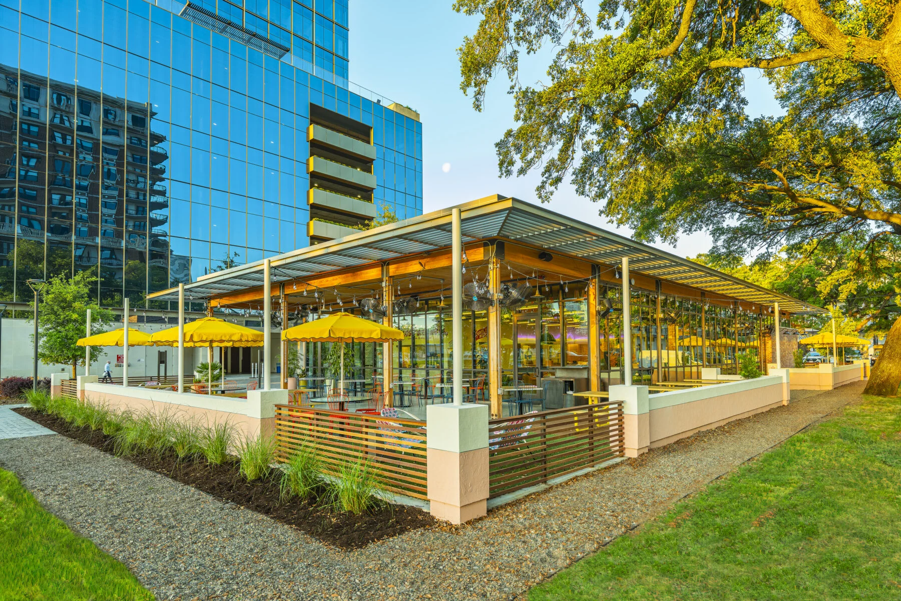 outdoor patio with yellow umbrellas for outdoor seating