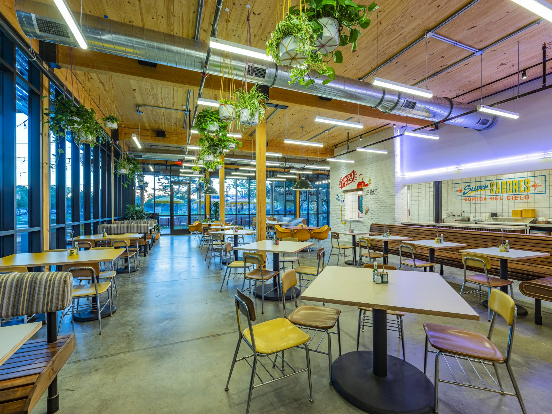 interior dining with plants and tables and chair