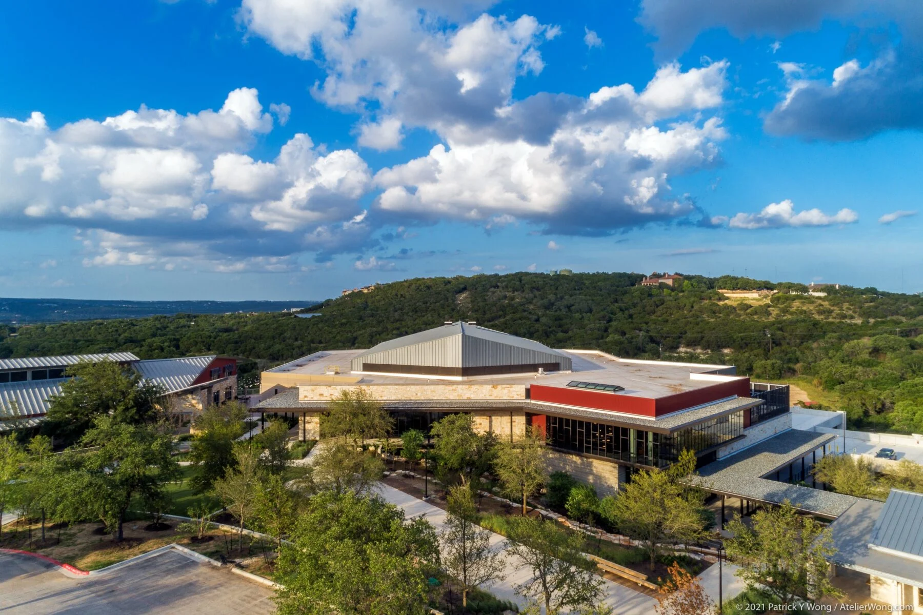 hillside two story church overlooking lake