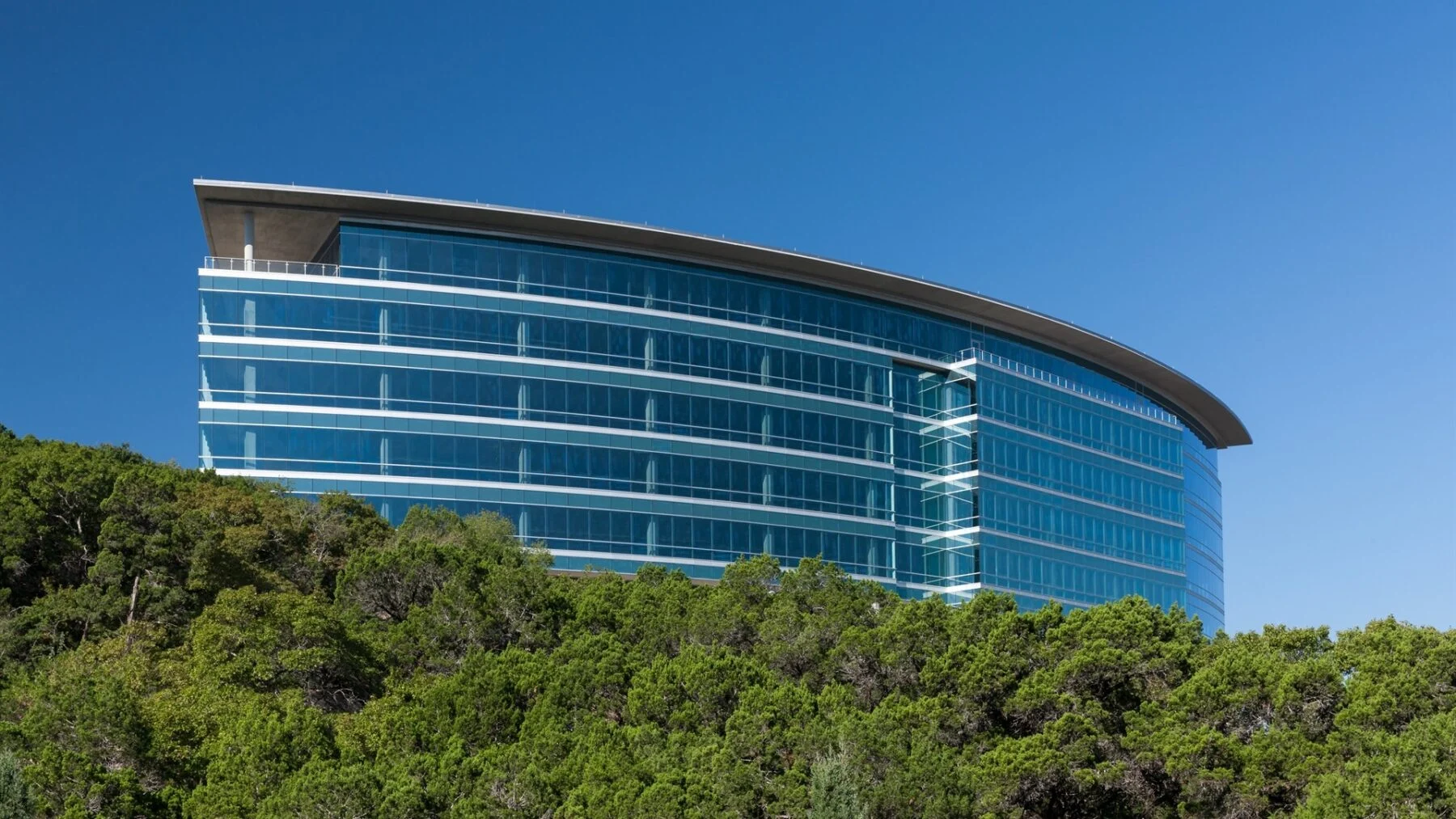 exterior curved office building full of windows