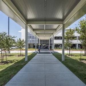 covered walkway to office parking garage