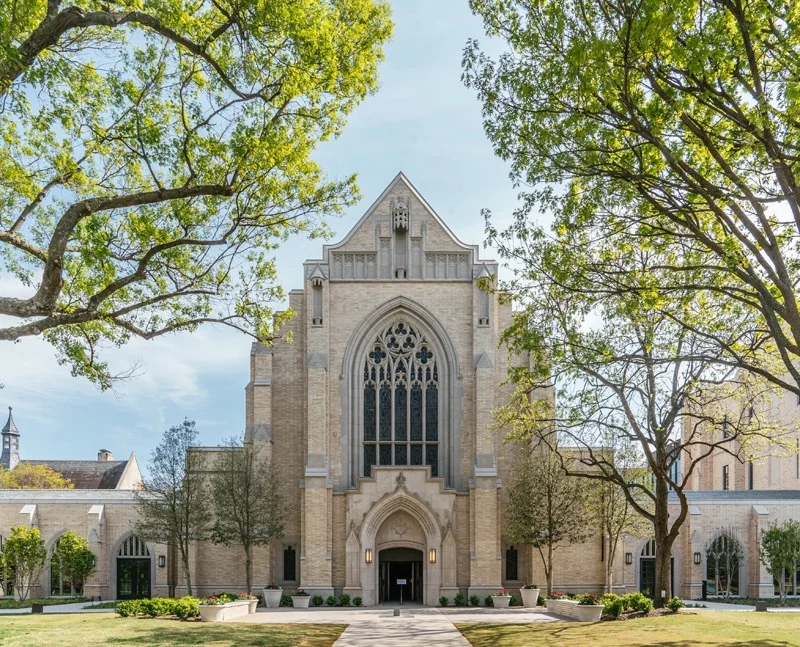 exterior of church with white stone and curved windows