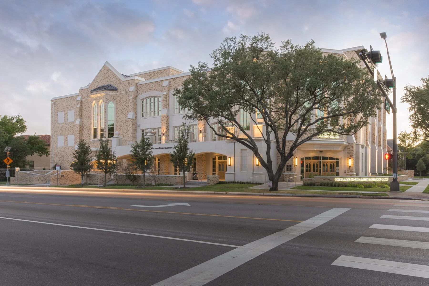 exterior white stone with tress and lobby