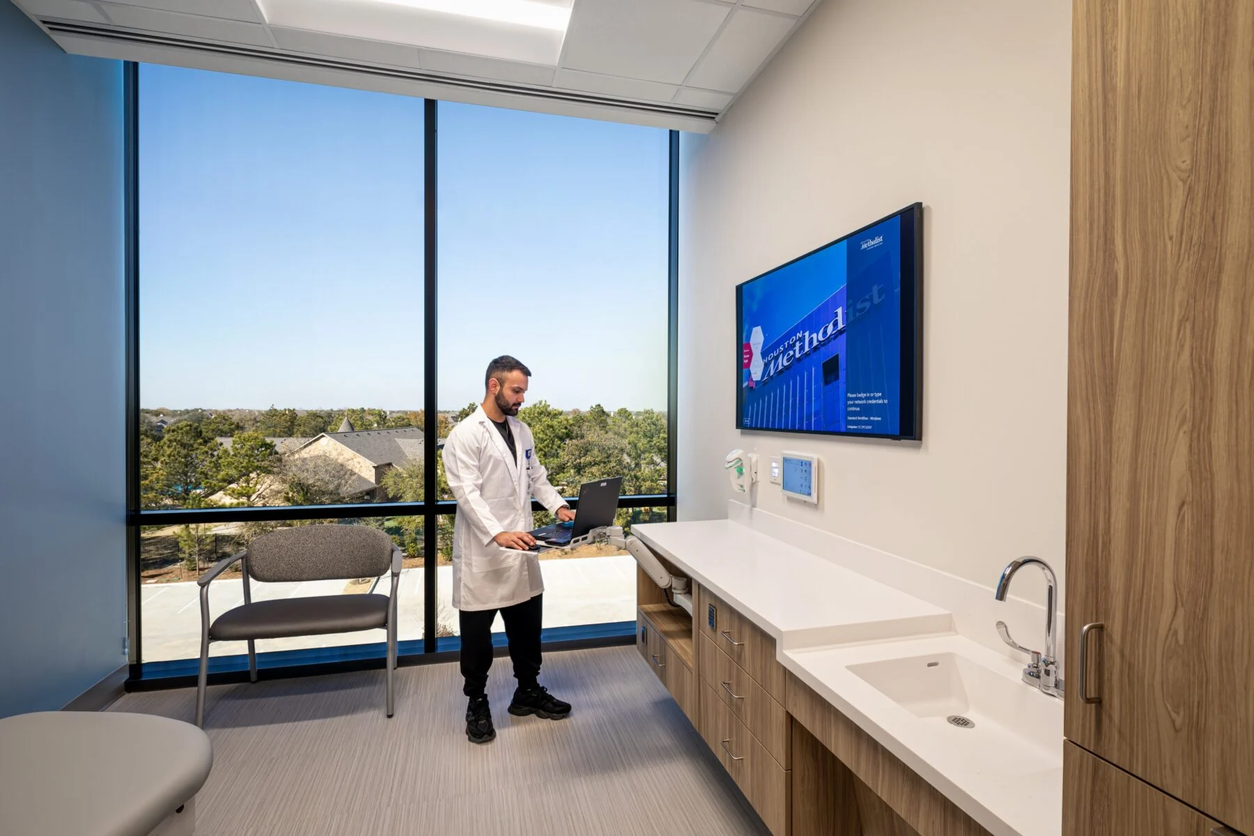 patient room with floor to ceiling windows
