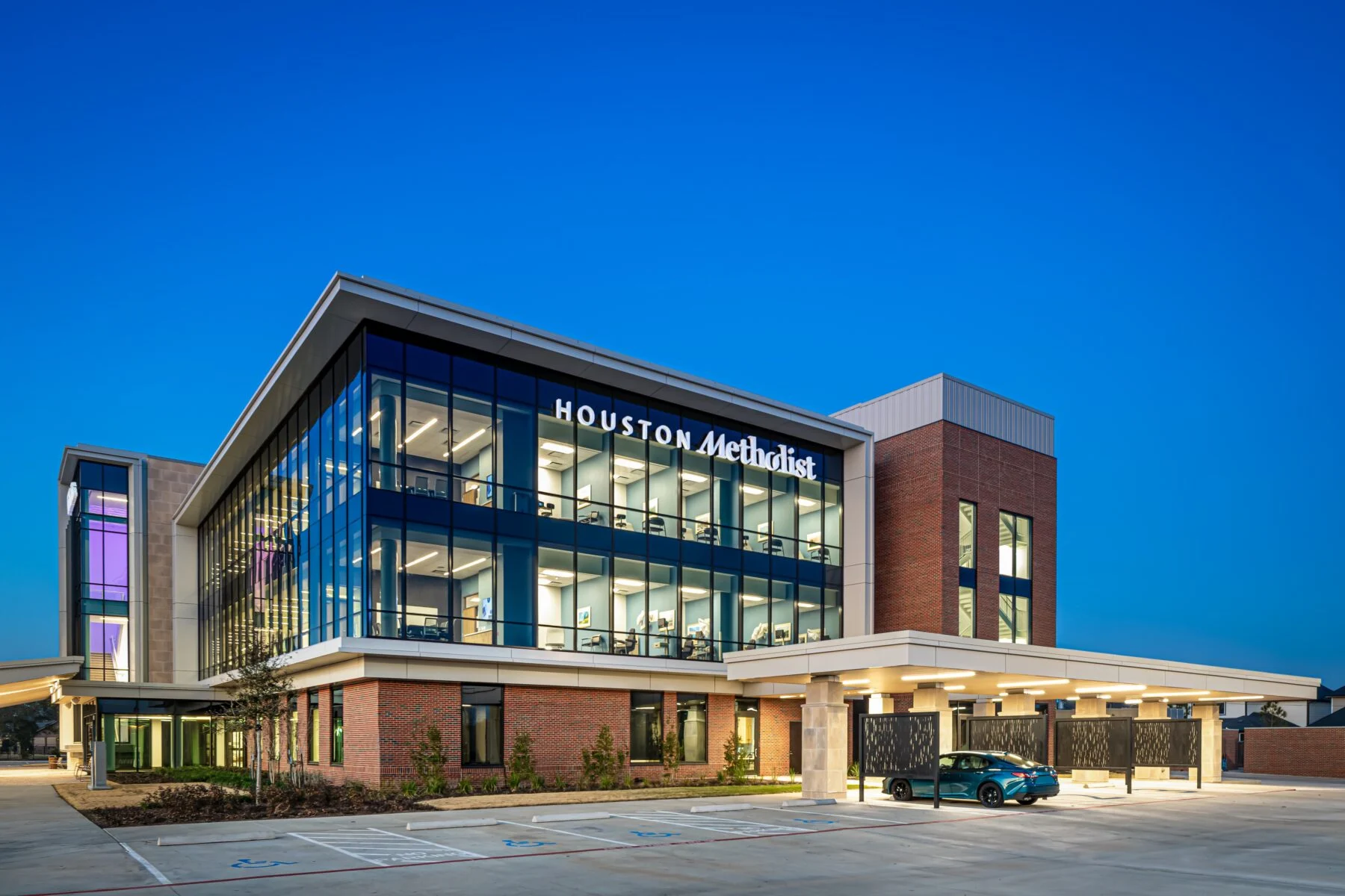 side entrance with covered parking