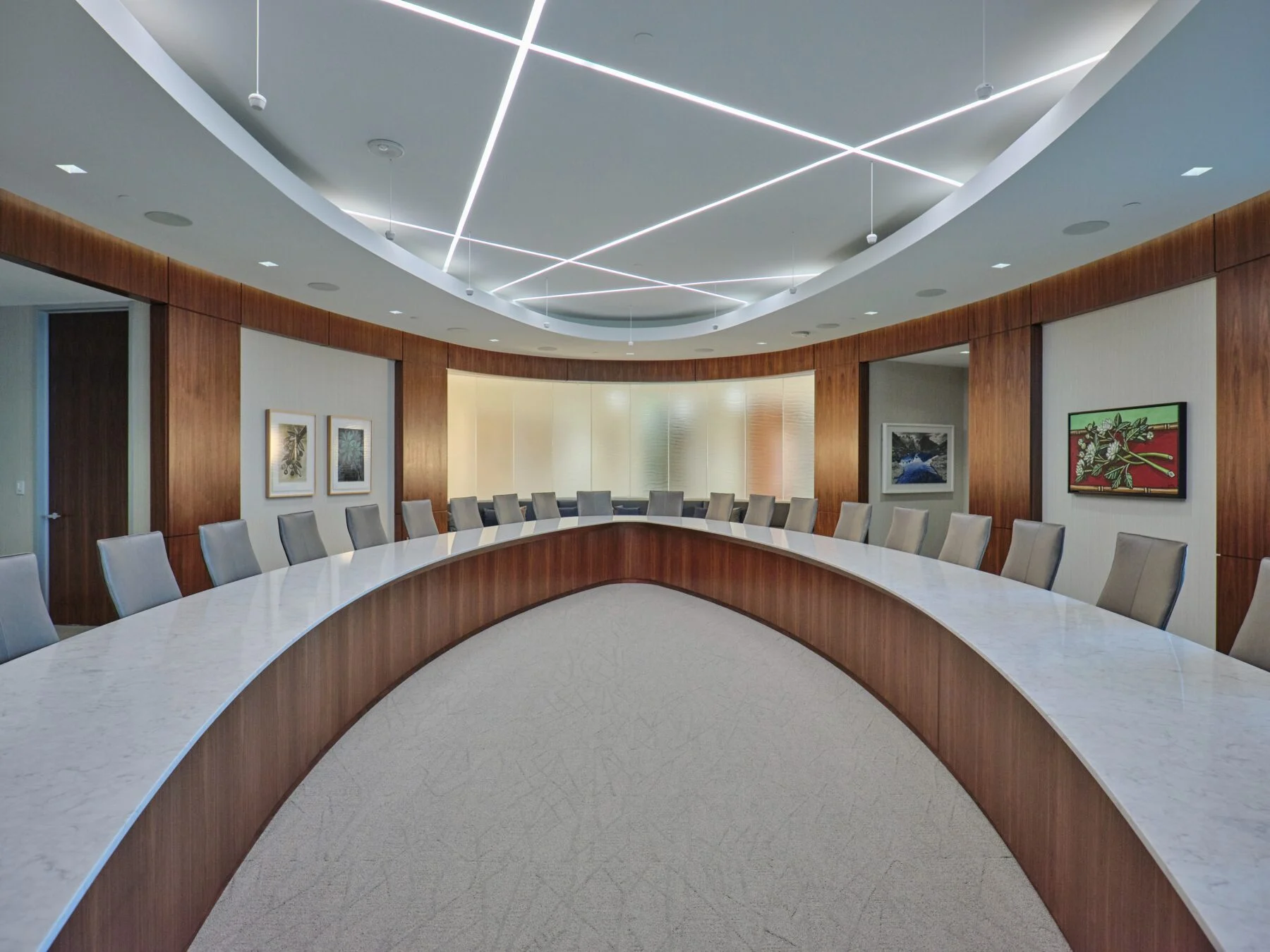 curved confrence room with round table seating