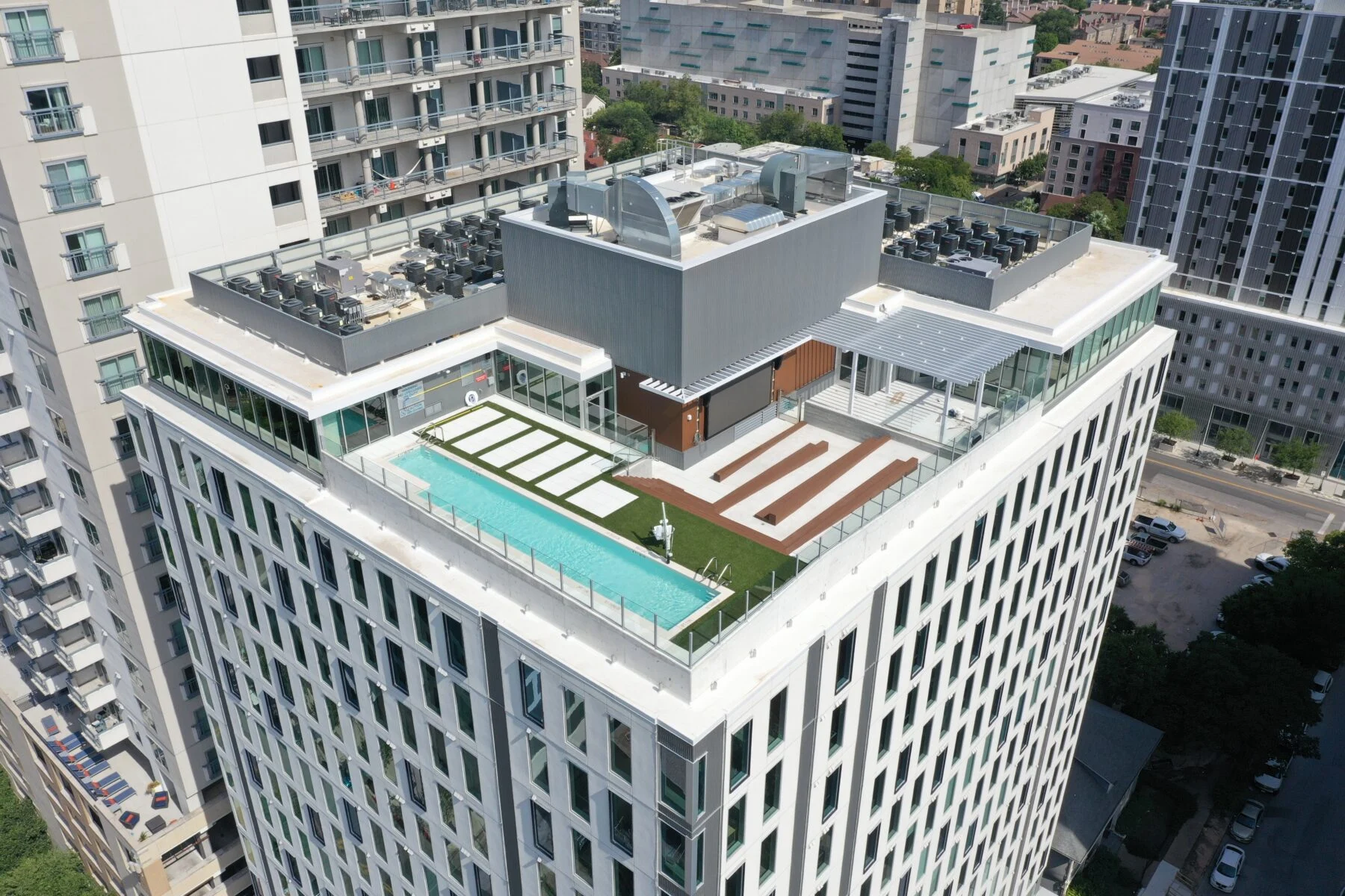 rooftop pool and patio with entertainment space
