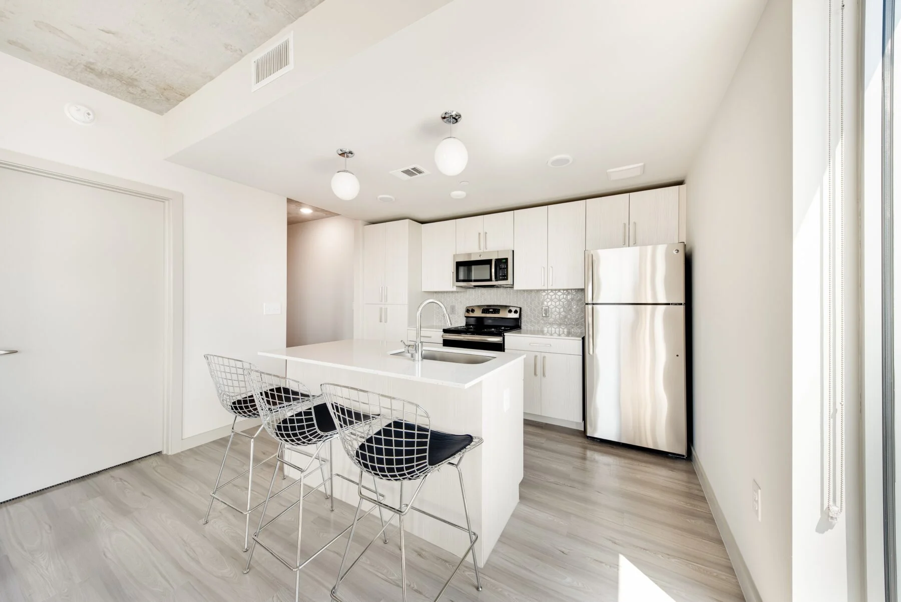 student apartment with kitchen and island