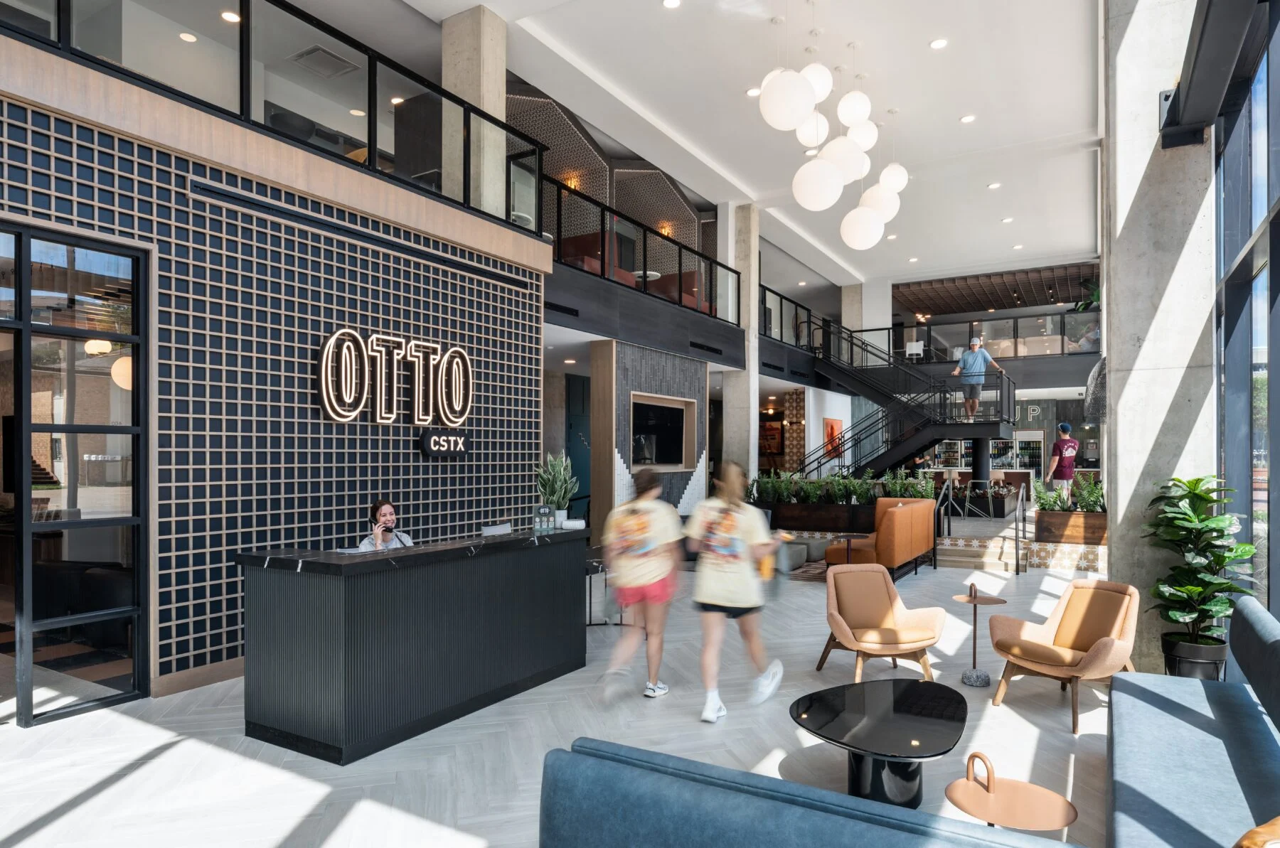 lobby space with tiled wall