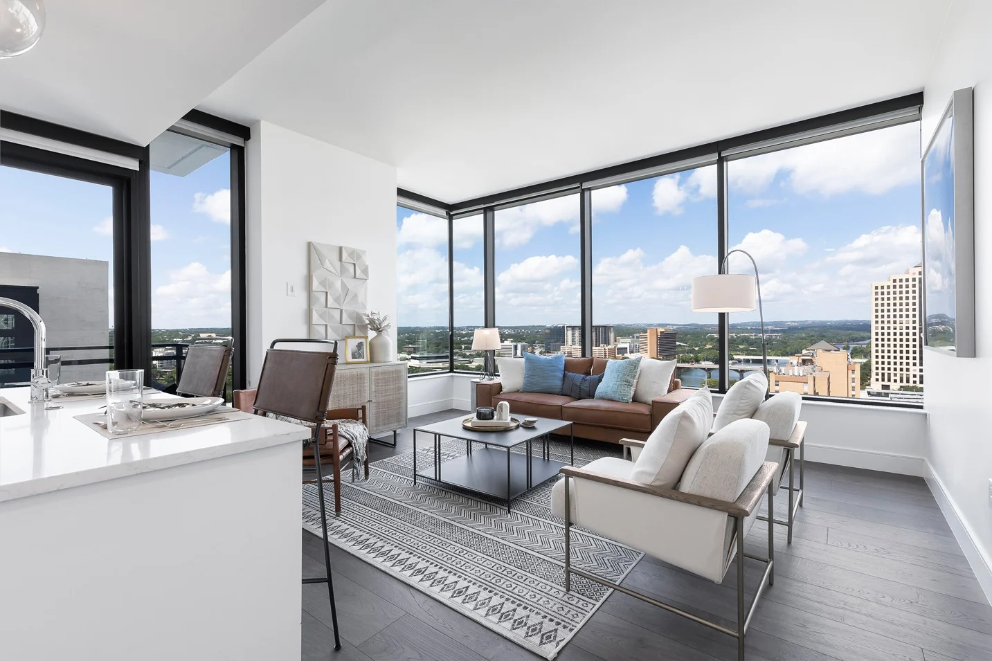 apartment living room with floor to ceiling windows