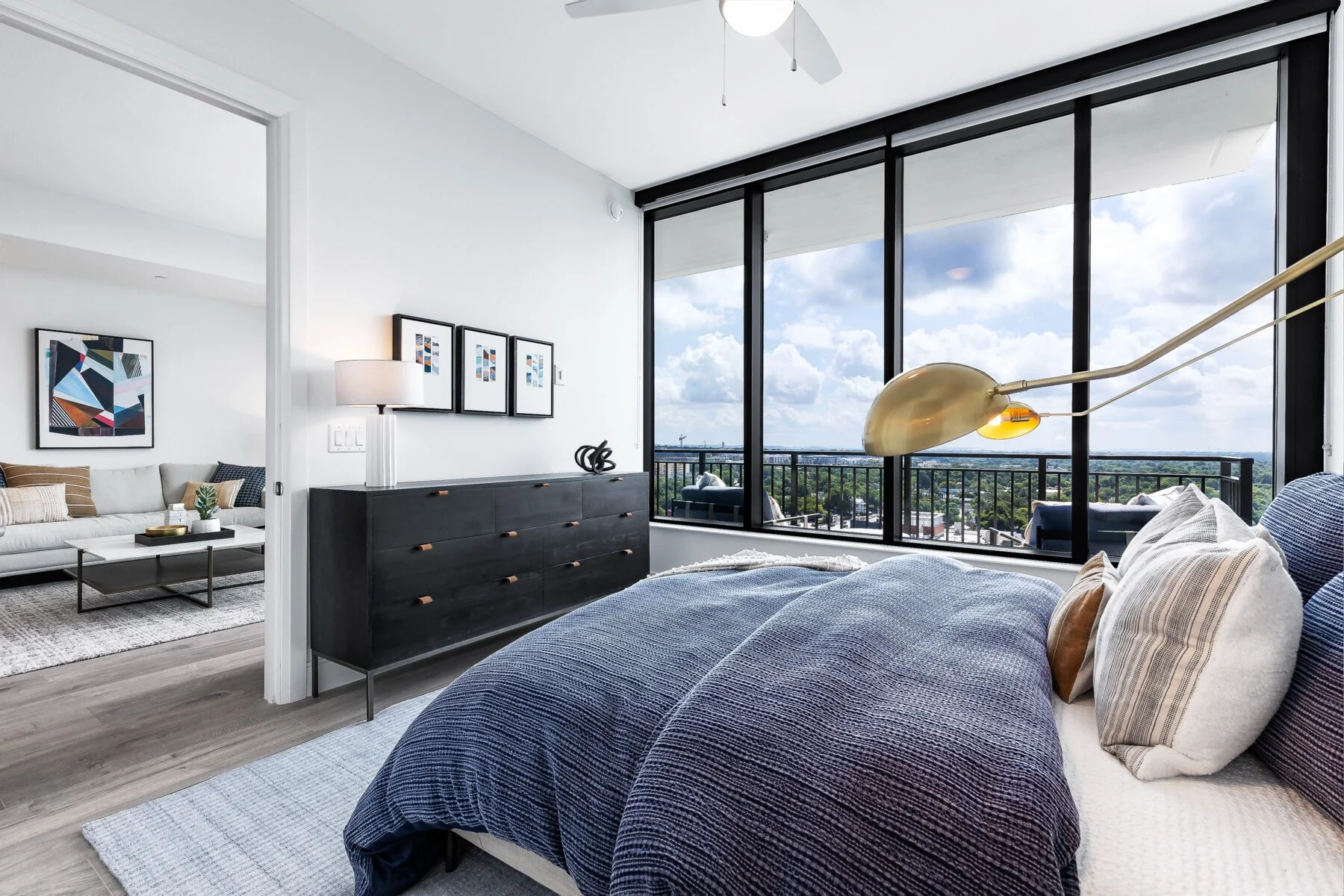 bed room with floor to ceiling windows