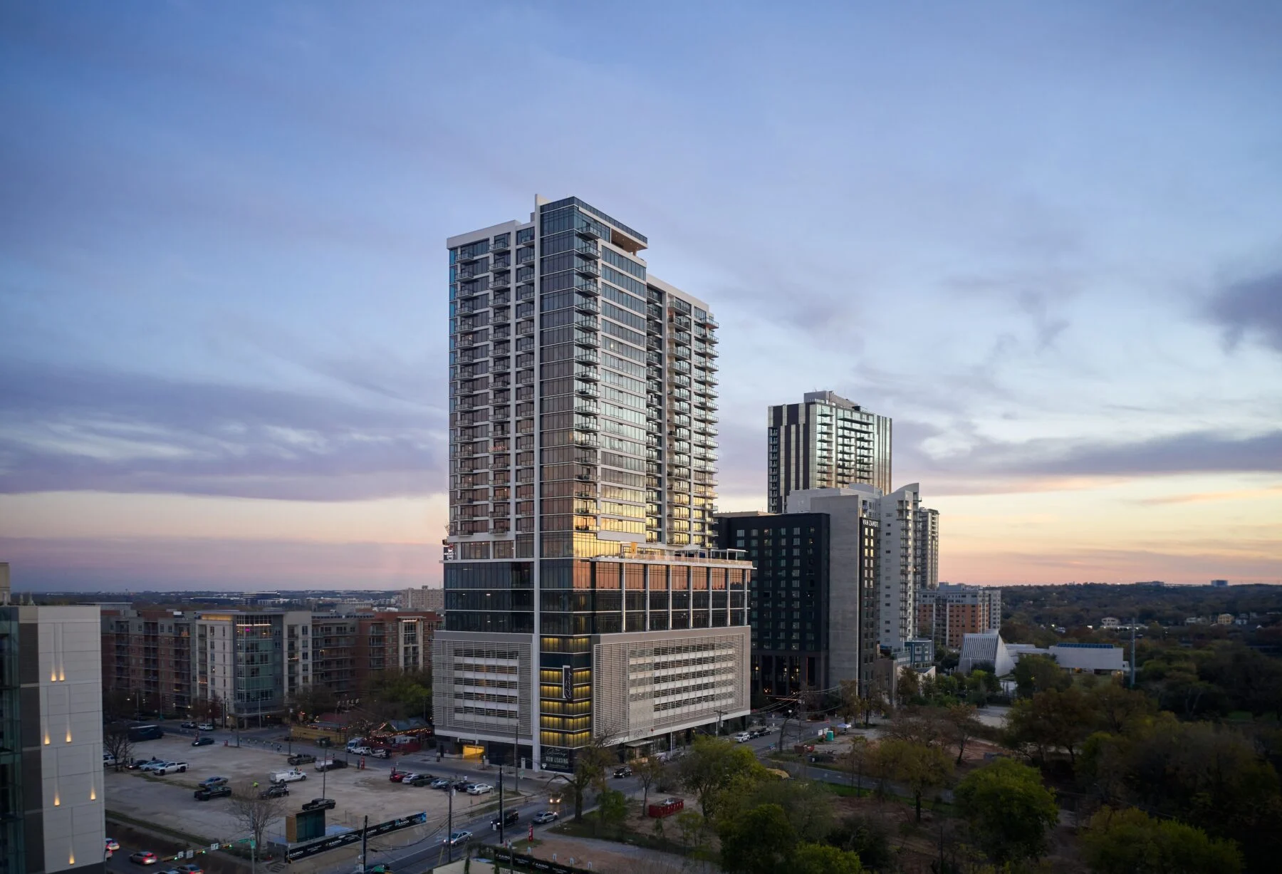 30 story mixed use tower with parking garage and retail space