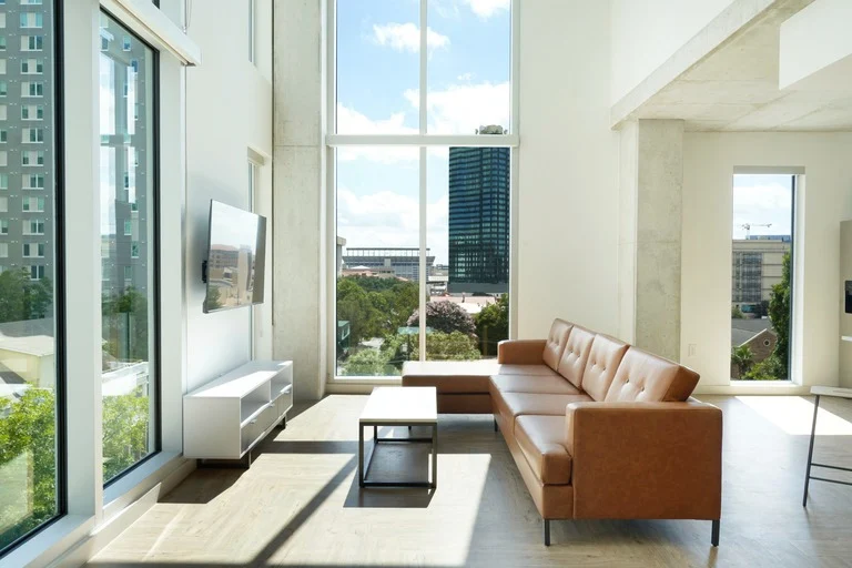 living room with floor to ceiling windows