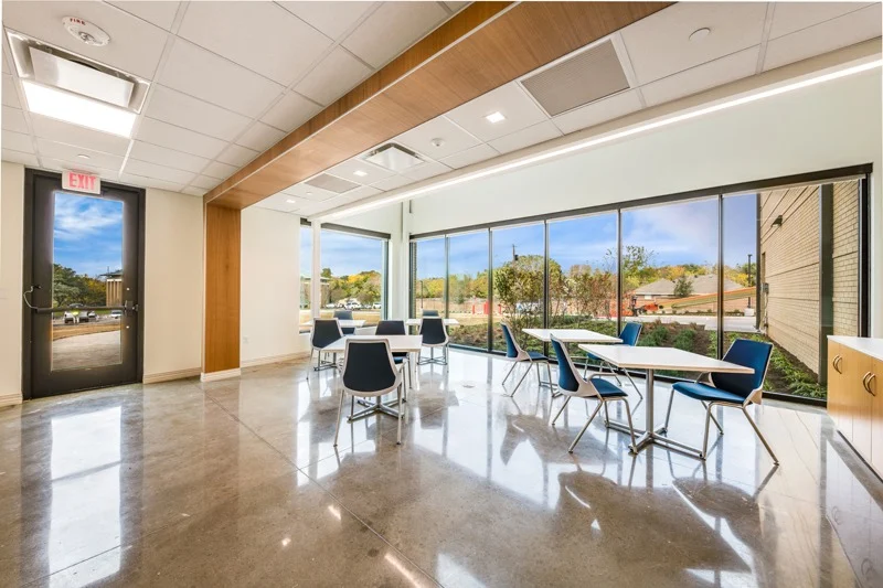 gather space by floor to ceiling windows
