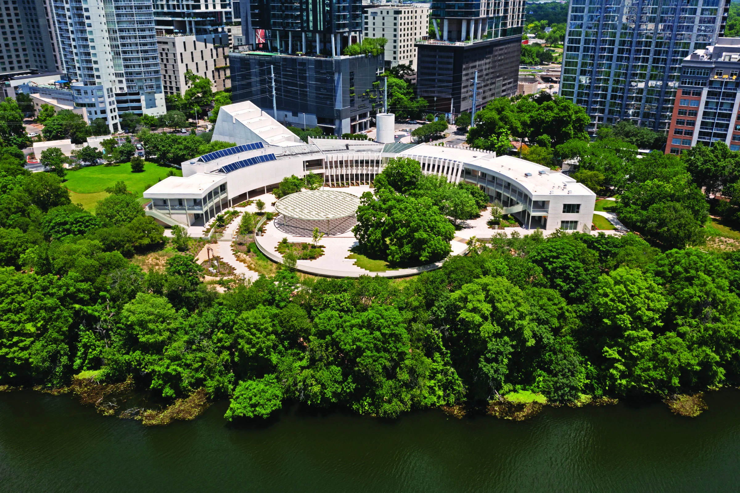 aerial photo of the MACC with trees along the Colorado River
