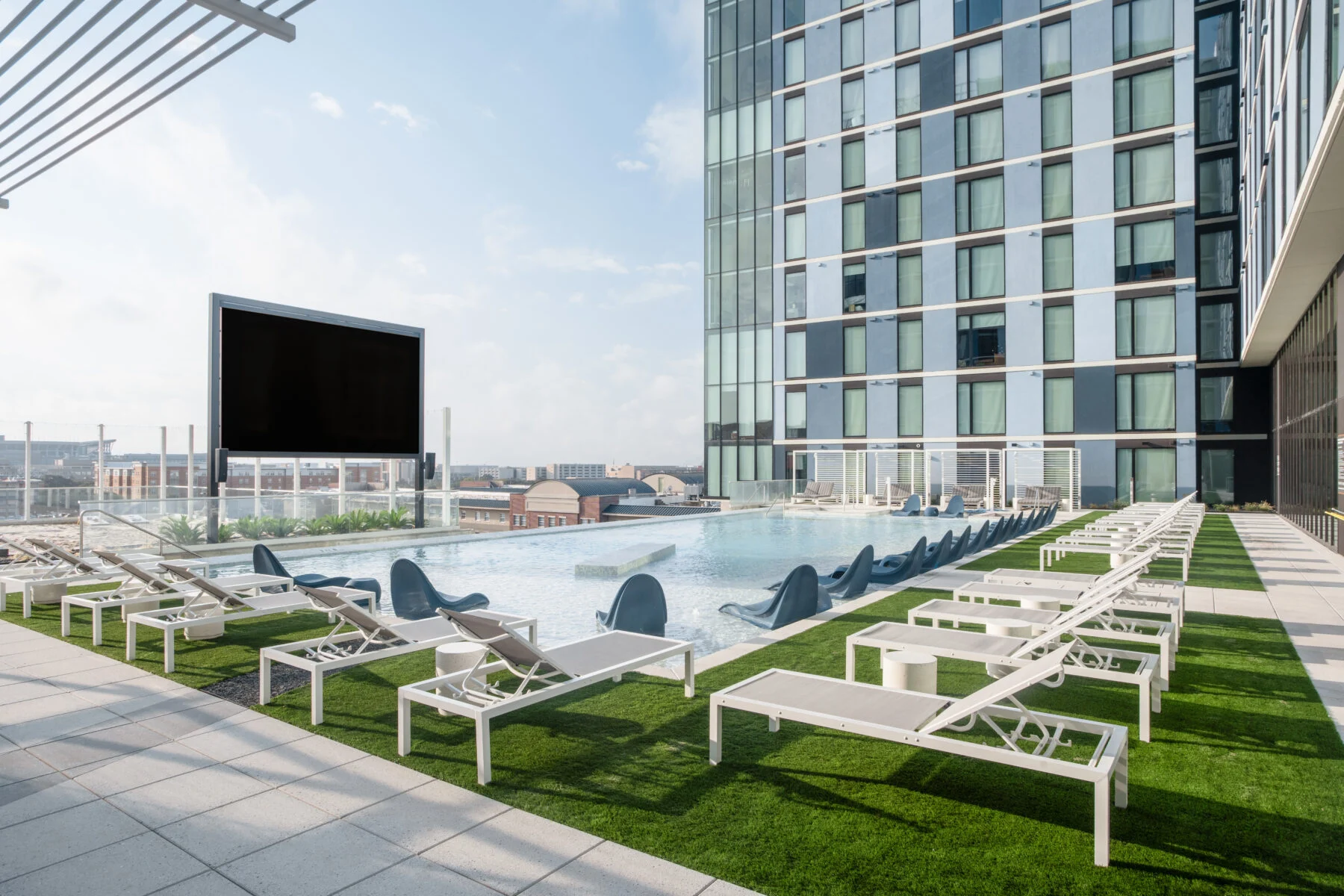 rooftop pool with turfed lawn