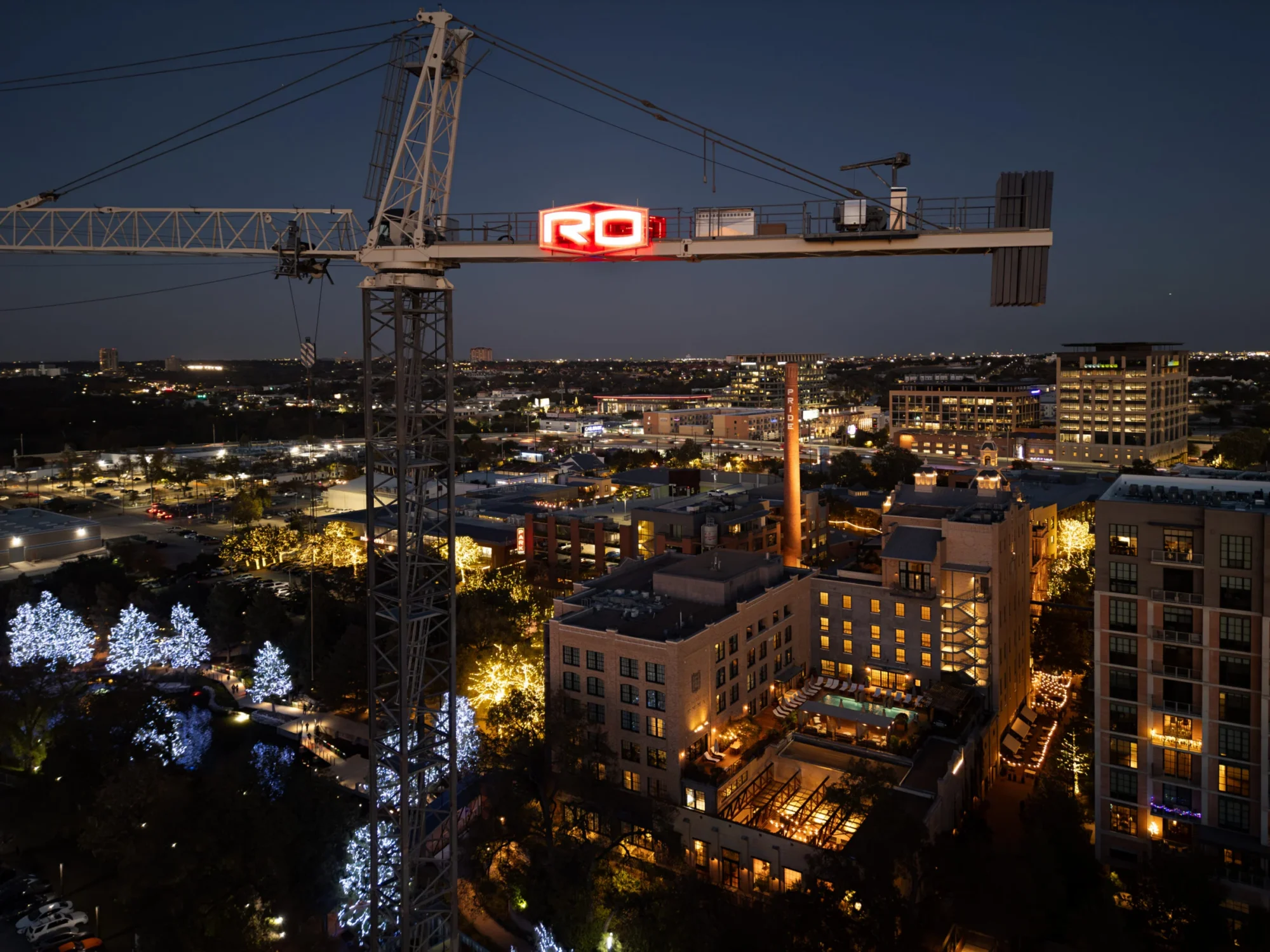 crane at night over pearl district in san antonio