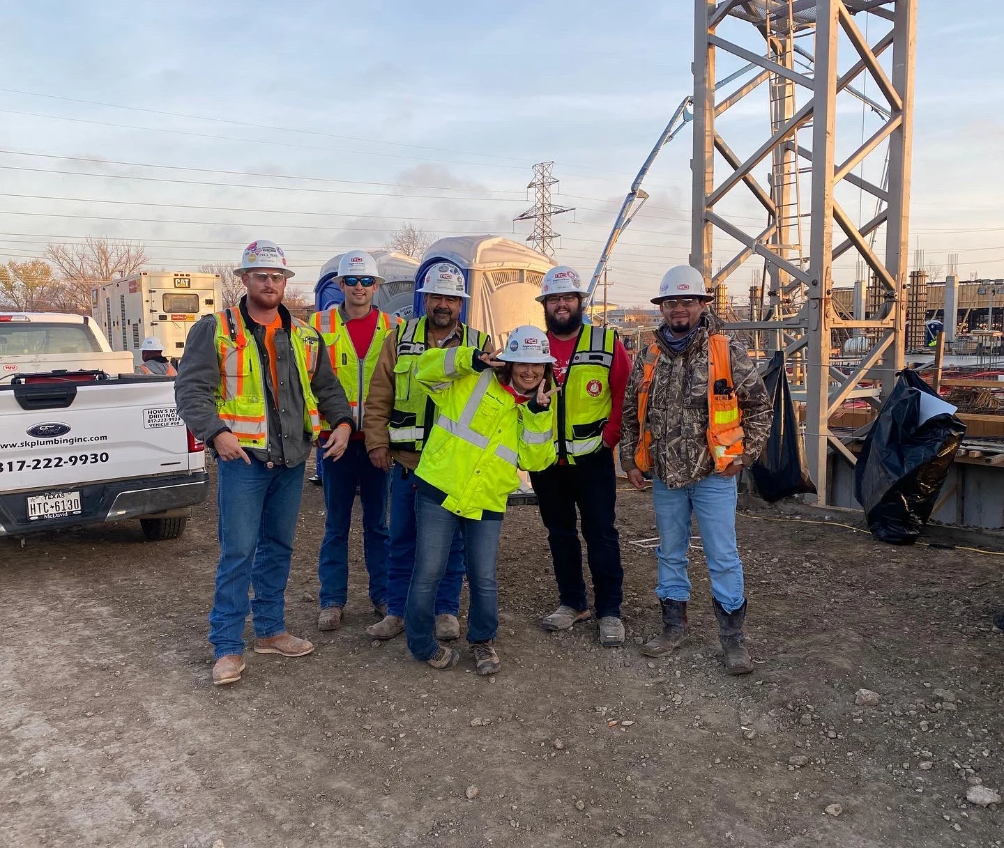RO team gathered at jobsite in PPE
